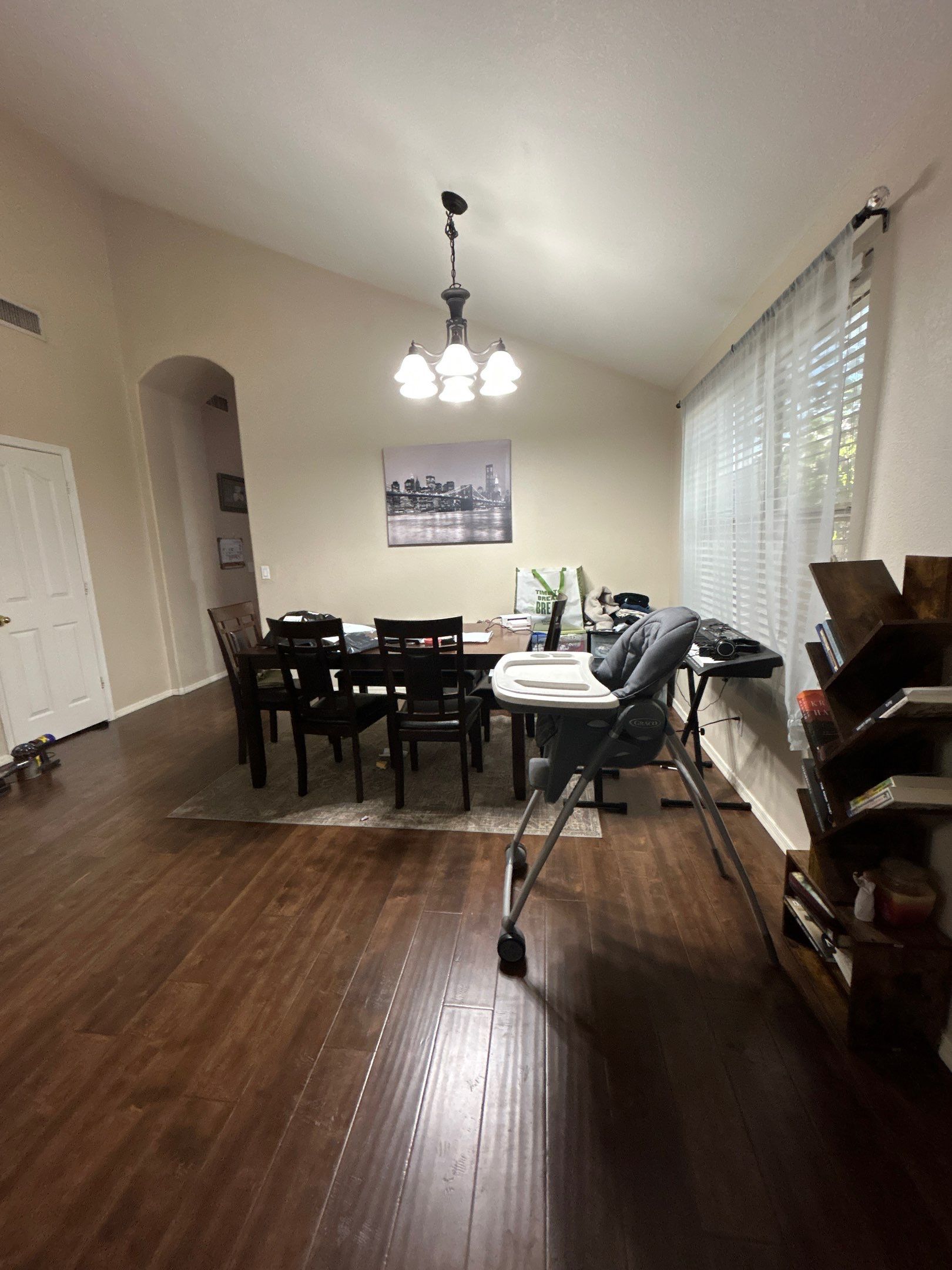 Dining Room Remodel with Dark Wood Plank Flooring in Chandler by CompanyCam Sales Demo