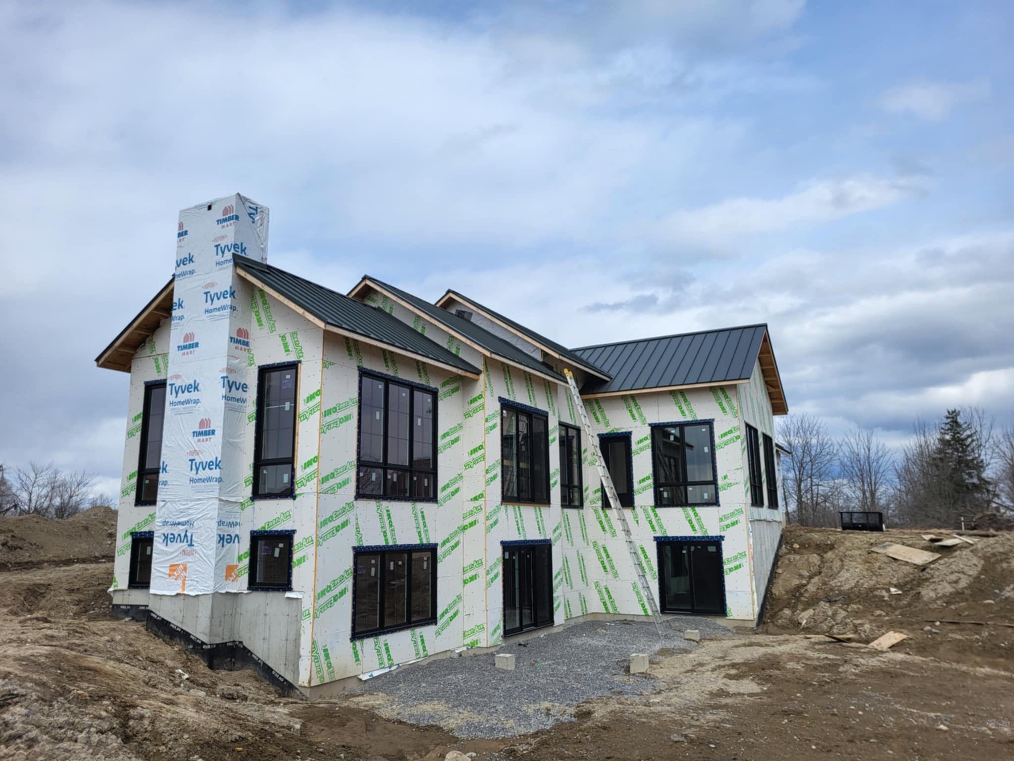 New Home Construction using 16" Standing Seam Panels by Jay Carter Roofing & Sheet Metal