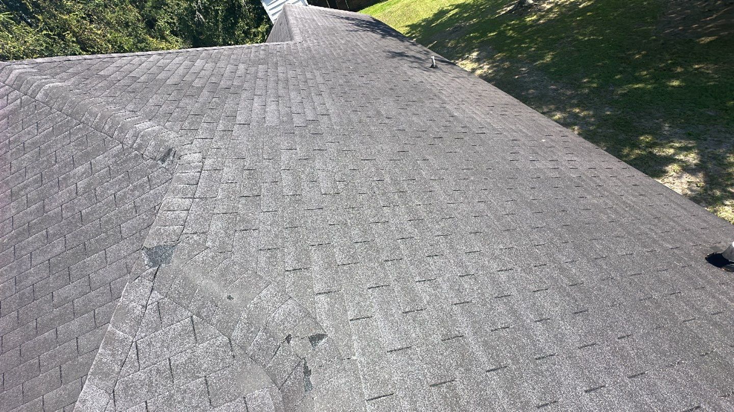 Residential Roofing Installation using Benton 26Ga 1inc Snapcock Metal Roof KYNAR Matte Black by Talya Roofing