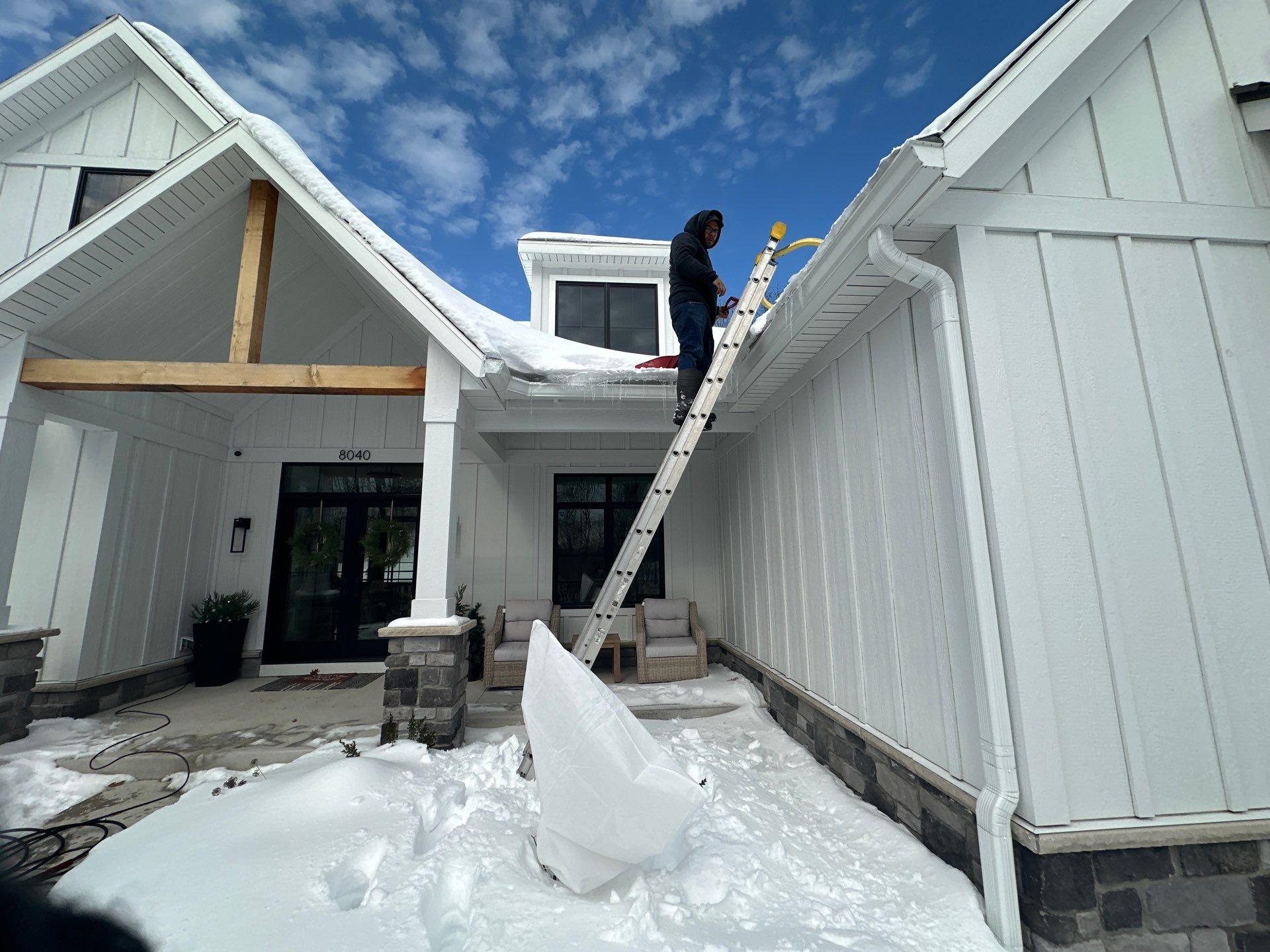 Residential Ice Dam Removal in Traverse City by Rainbow Seamless Systems