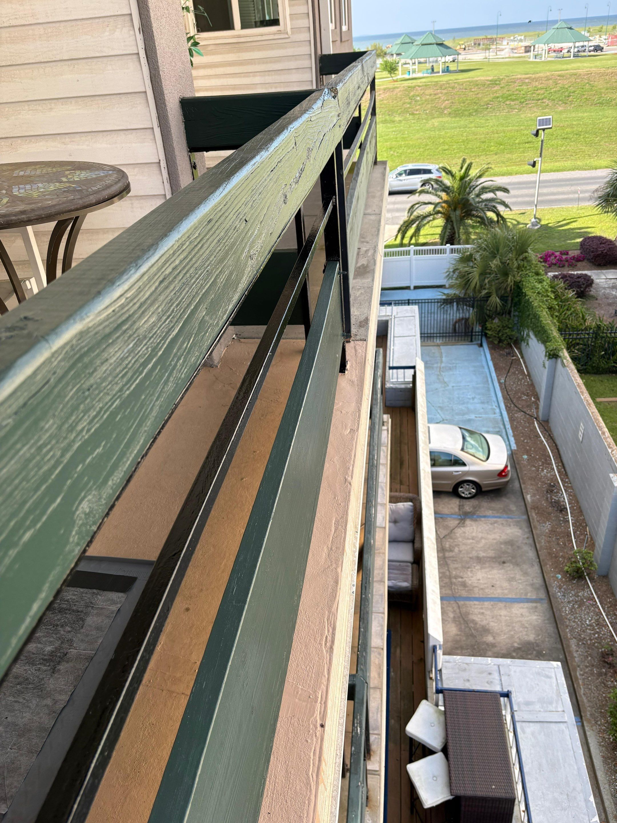 Wood Balcony Railing Replacement in Metairie by King Cole Construction