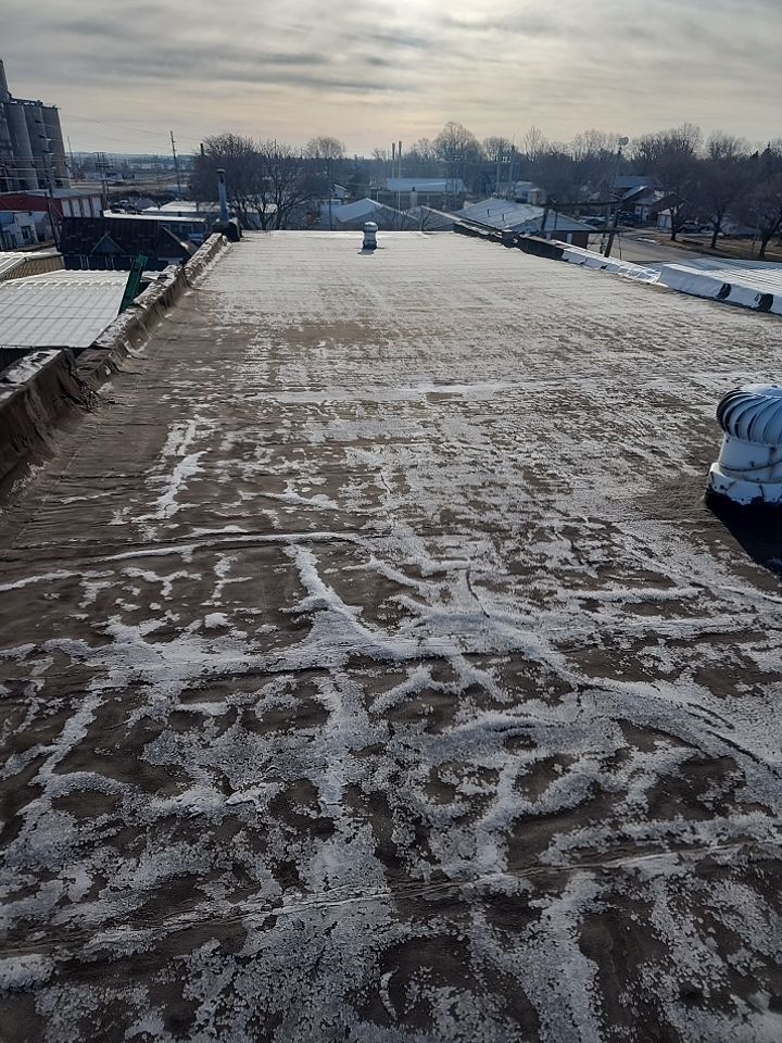 Recover of a downtown building  by Grell Roofing, LLC