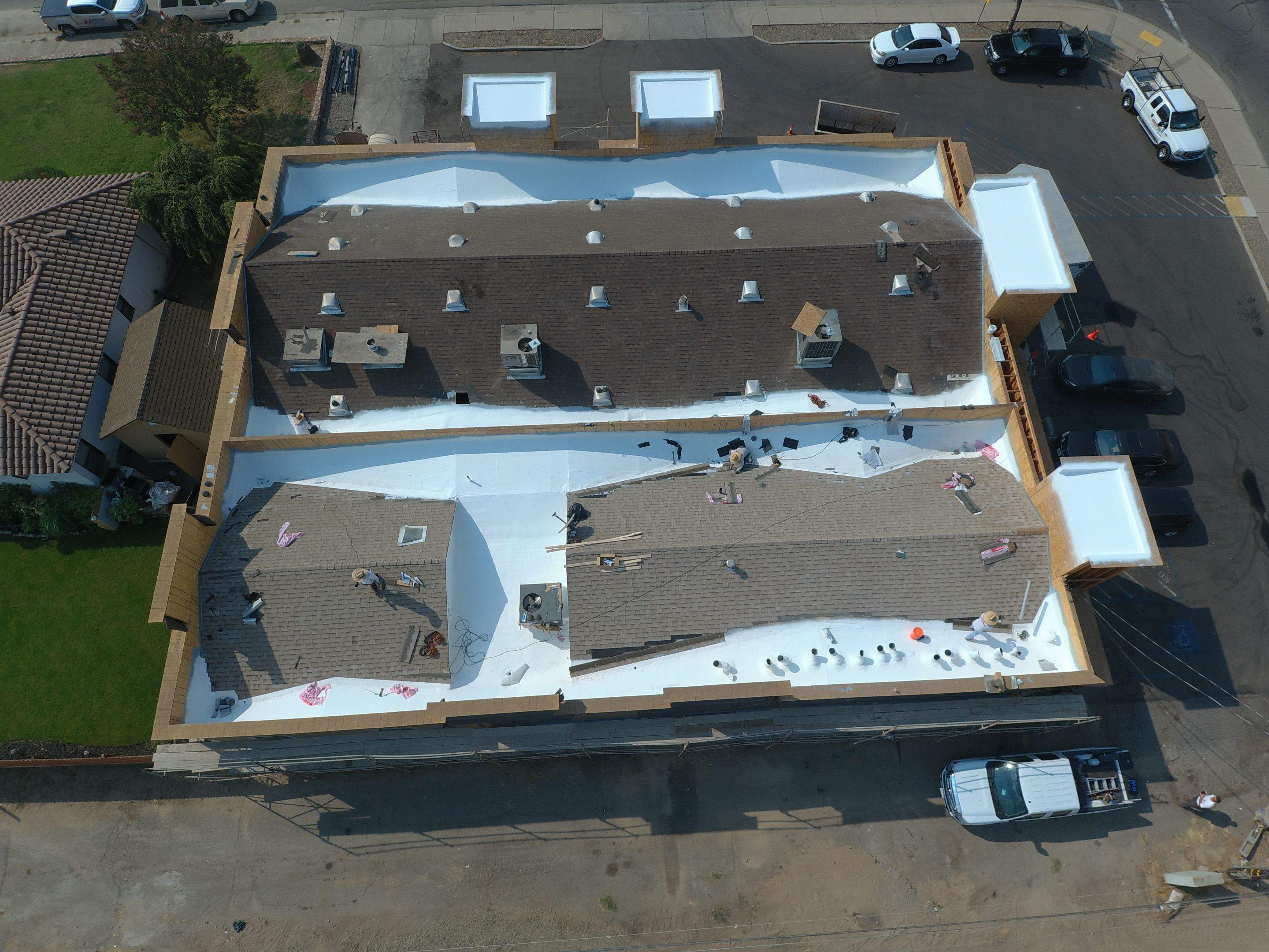 Spray foam and coatings using Conklin Benchmark/PUMA XL coatings and spray foam by Straight Edge Roofing Inc