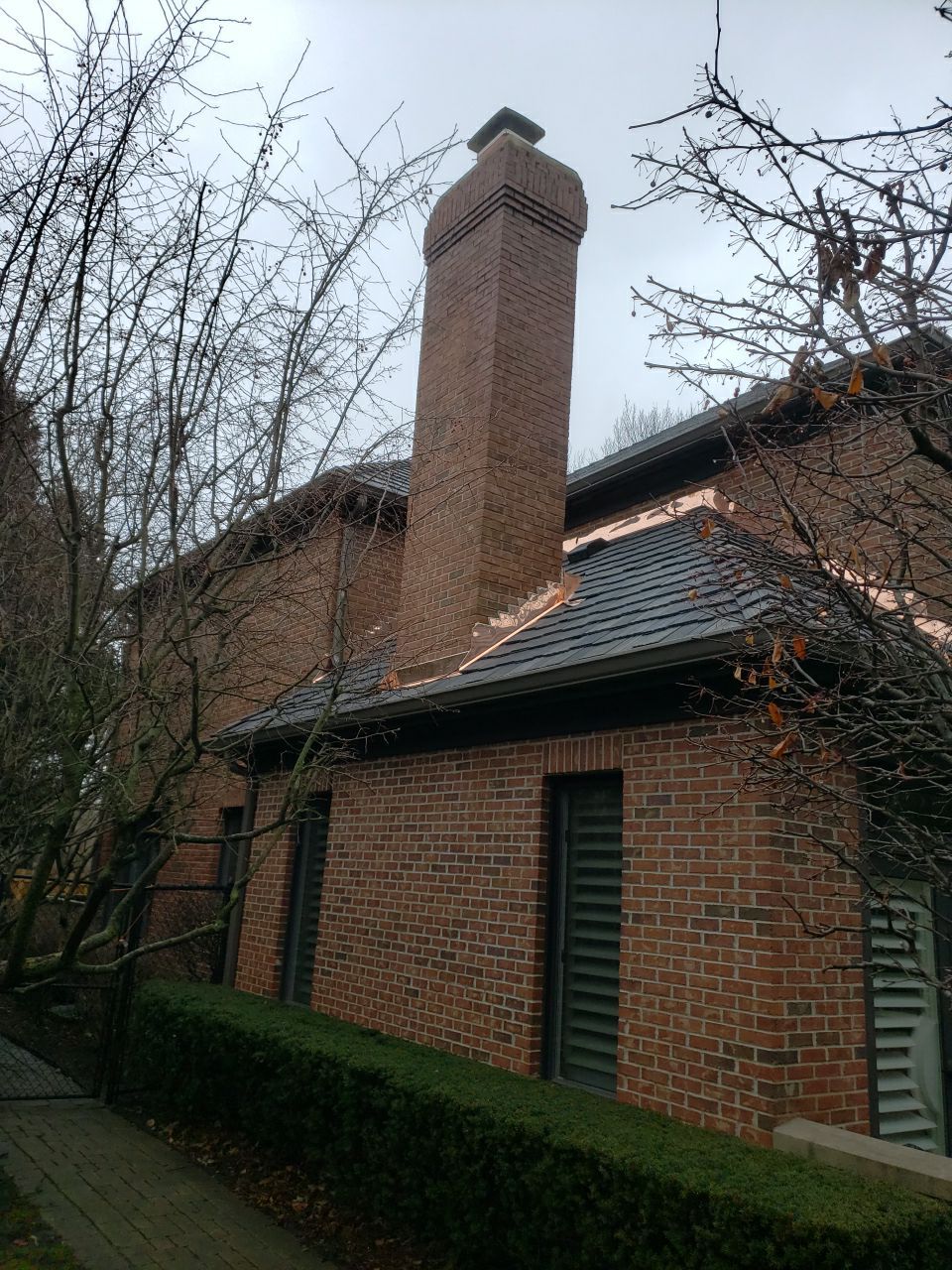 DaVinci Slate Installation with Copper Valleys by Custom Installations