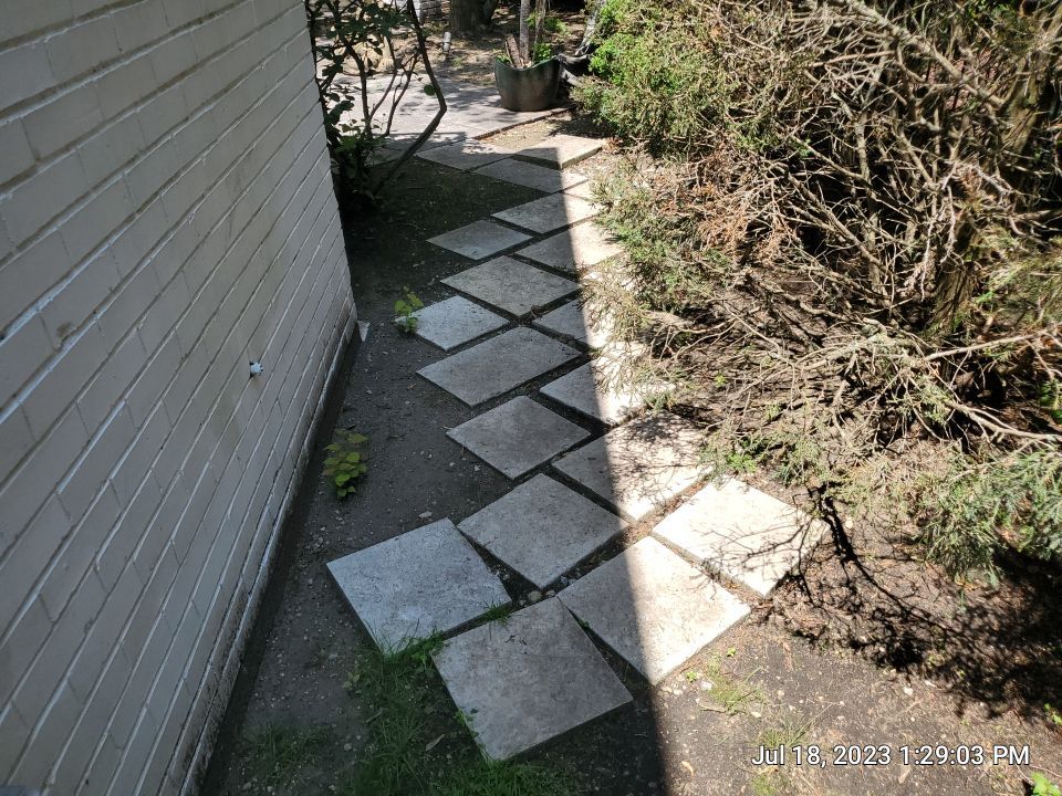 marble patio cleaning and sanding using Polysweep polymeric sand by Northern Power Washing LLC.