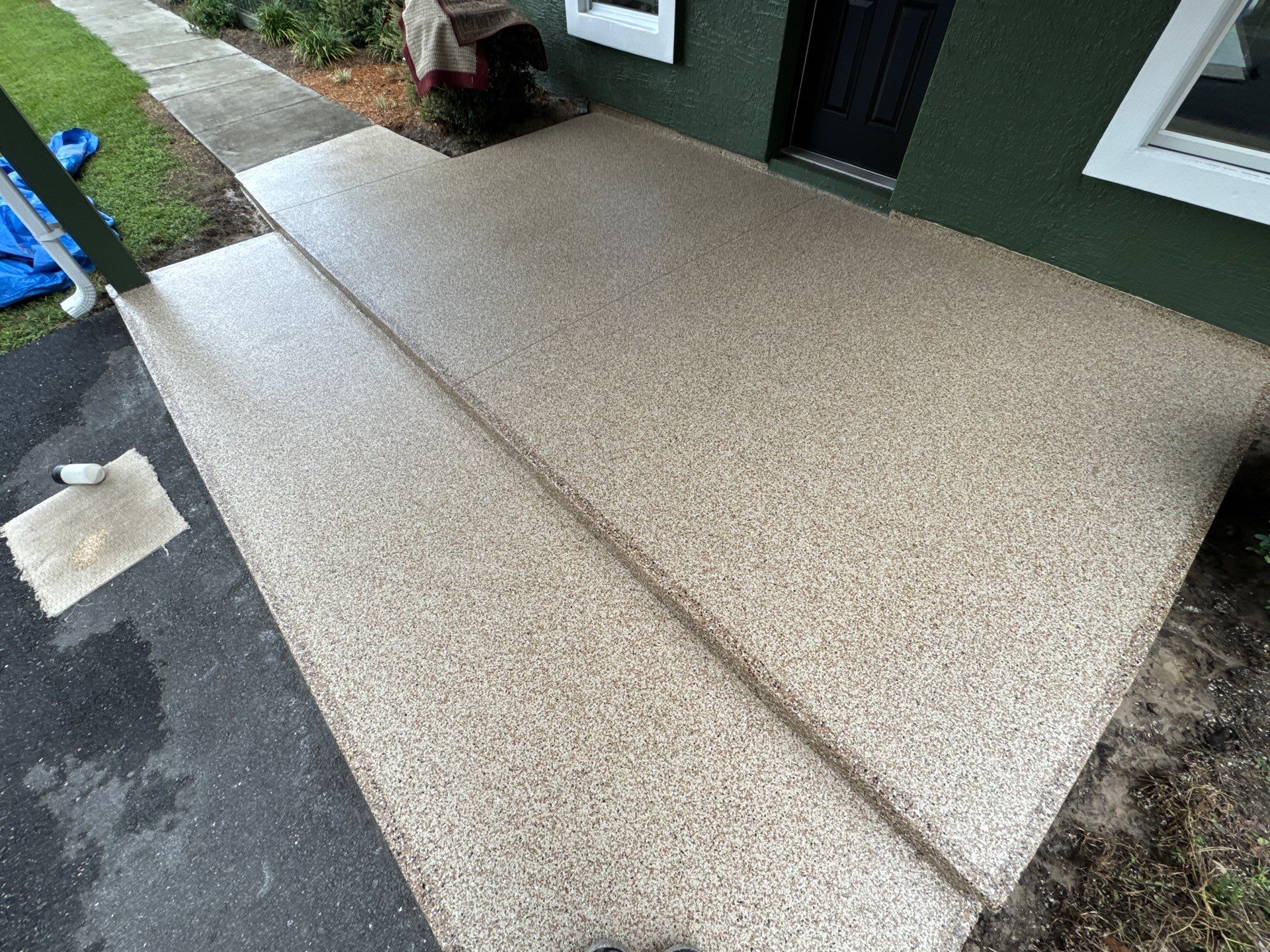 Porch Project in Reddick, FL in Pecan by Cross Creek Concrete Coatings