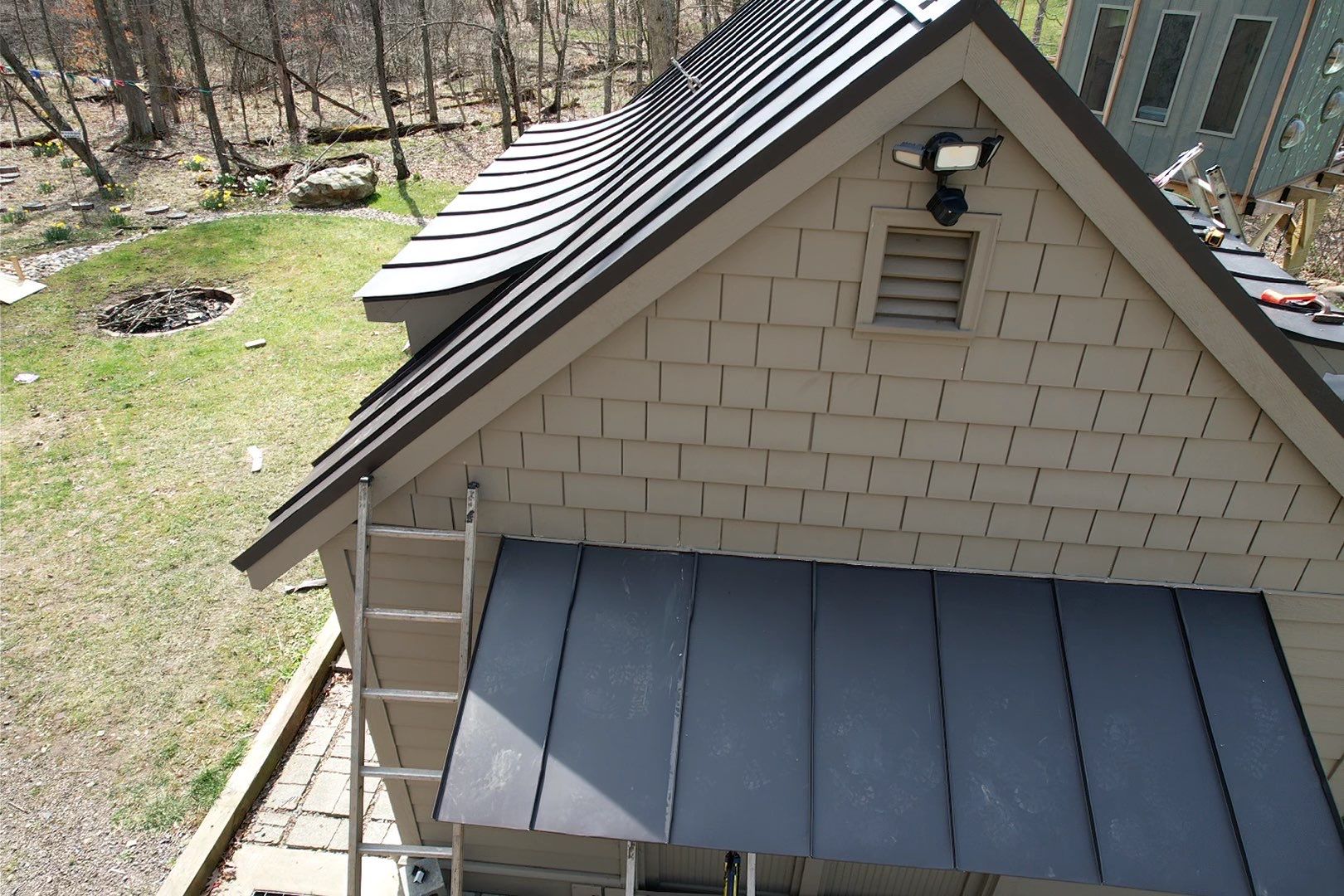 Metal Roof Replacement  by American Home Contractors