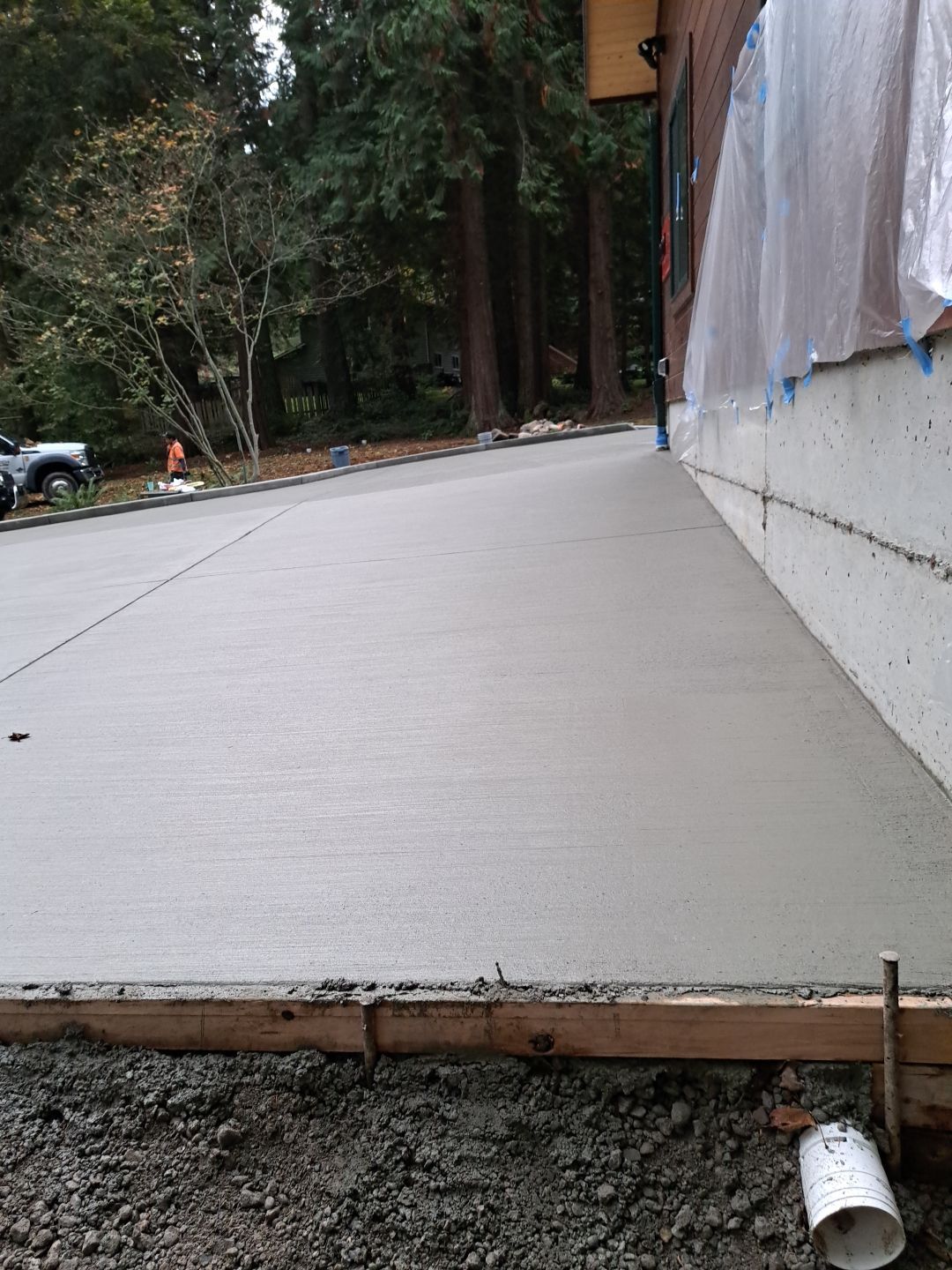 Pia | Custom Concrete Driveway, Walkway & Floating Steps by Jireh Asphalt & Concrete Inc 