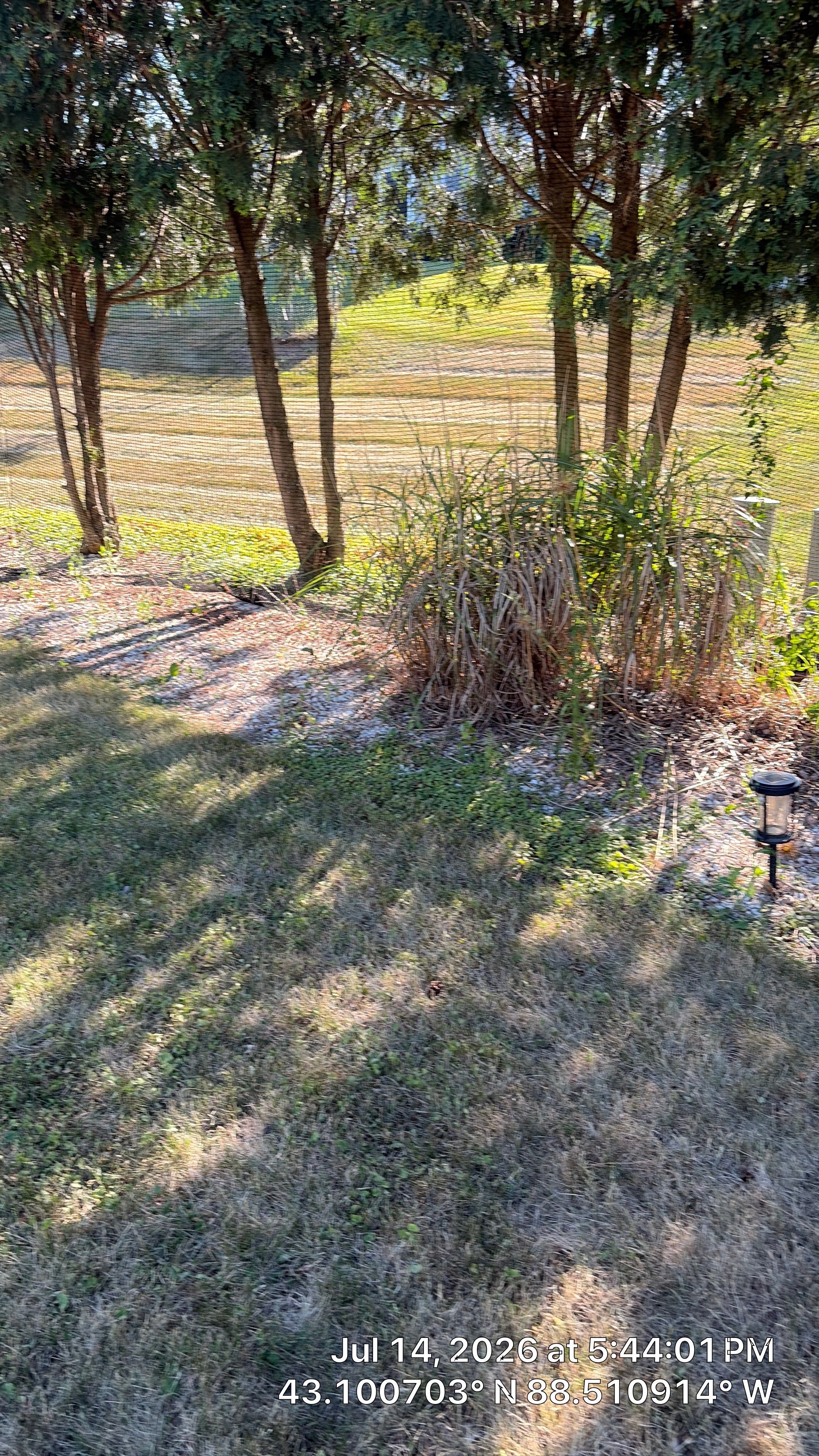 Decorative Stone and River Rock Landscaping for Oconomowoc Residence by CompanyCam Sales Demo