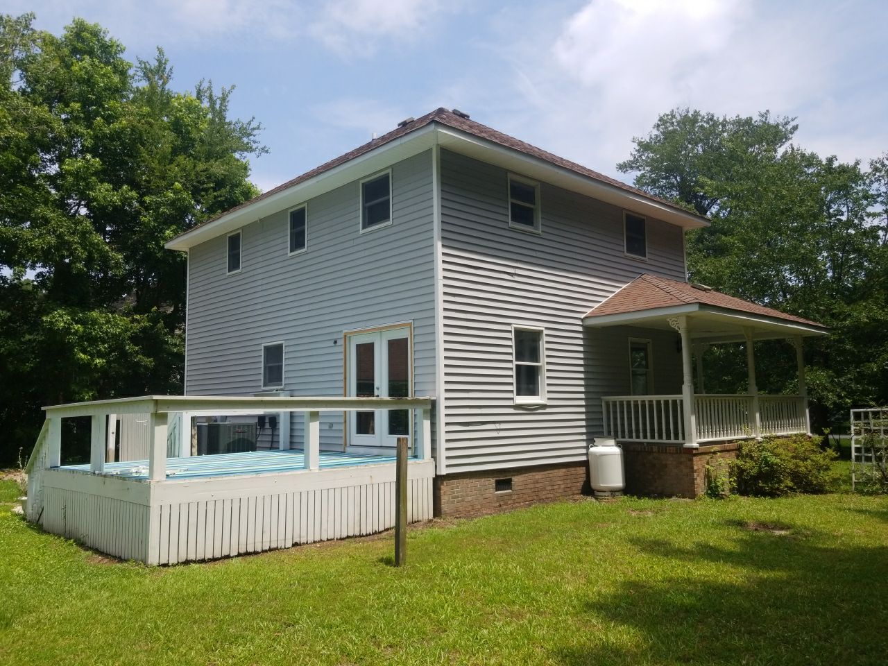 Hughes - Gutter 107 Maid Marian Court • Manteo, NC 27954 by Gallop Roofing & Remodeling, Inc.