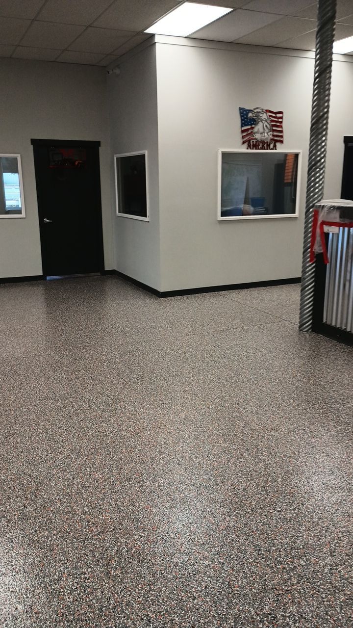Equipment Share Commercial Floor Transformation using Smoke w/ 5% Orange by Croc Coatings, LLC