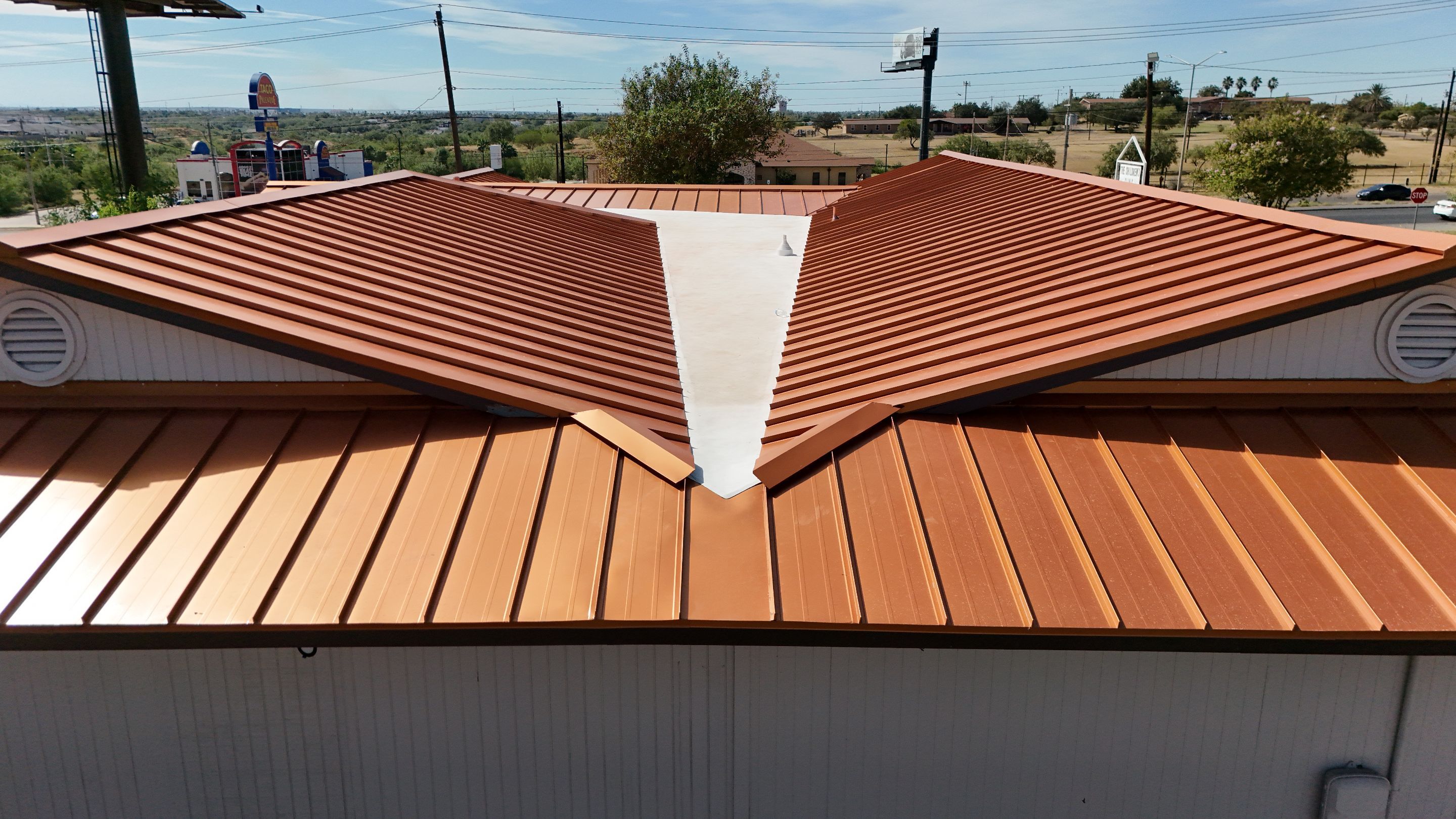 Copper Standing Seam Metal Roof Installation for Laredo Medical Clinic by JM Flores Roofing & Construction, Inc