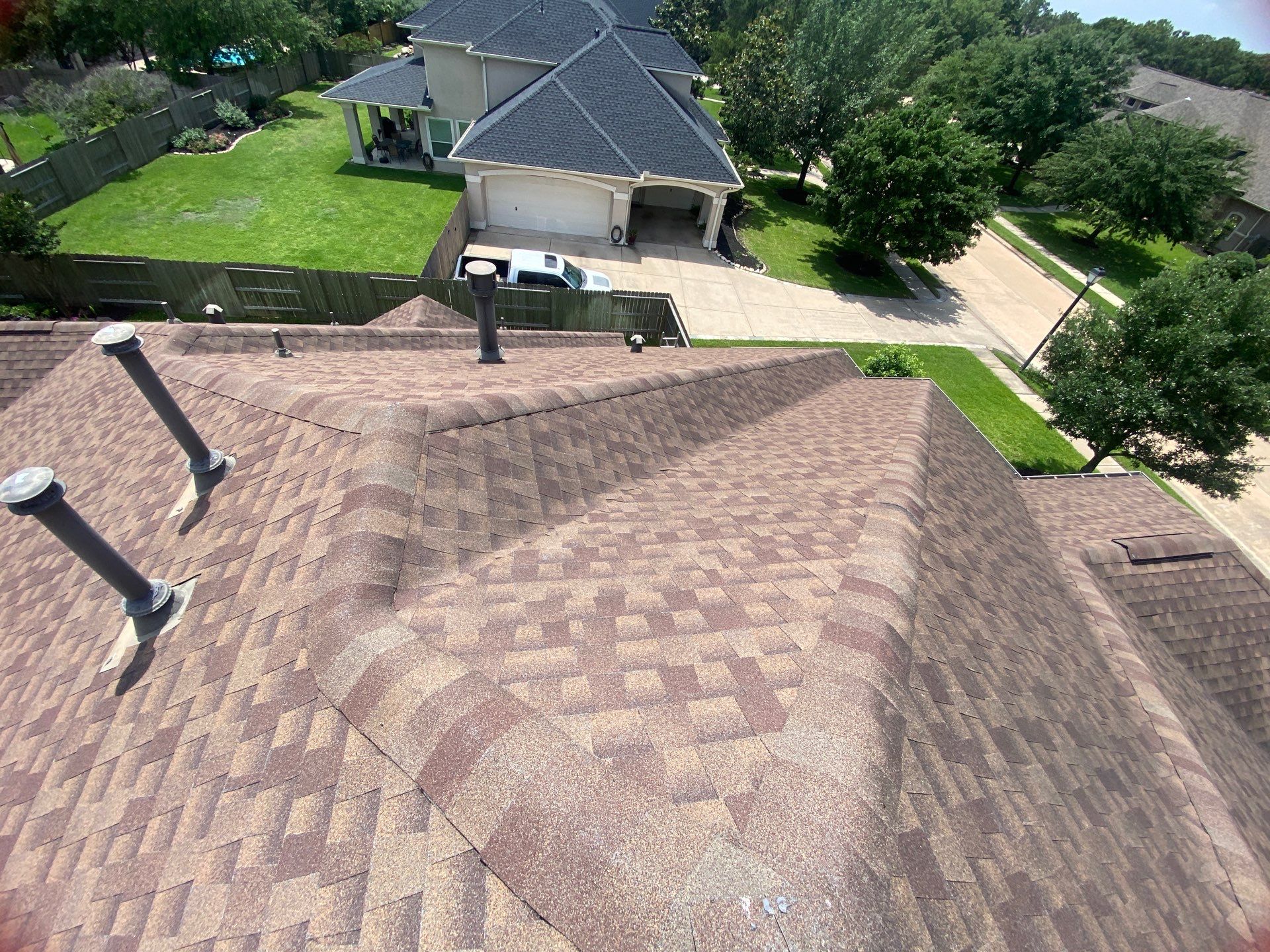 Hail Damage using Owen's Corning Duration (Lifetime) Shingles by Roof Repair Company