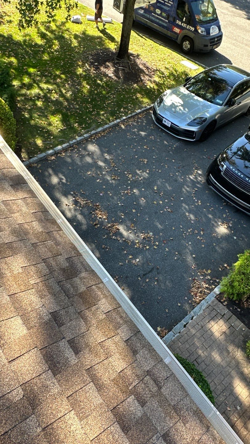 Roslyn Gutter Cleaning and Microguard Gutter Shield Installation by Above All Gutters 