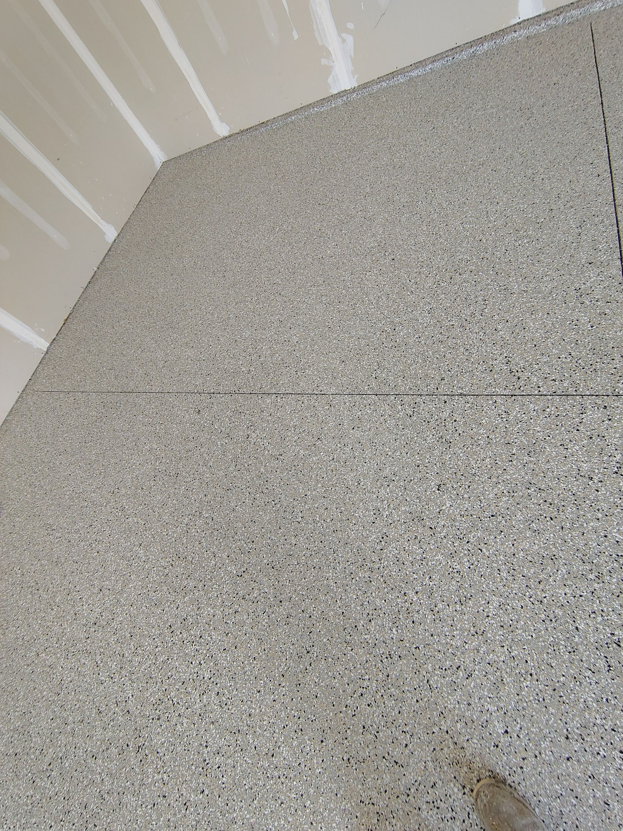 Epoxy Garage Floor Coating with Decorative Flake in Harrisburg by Select Painting, Coatings & Garage Cabinets