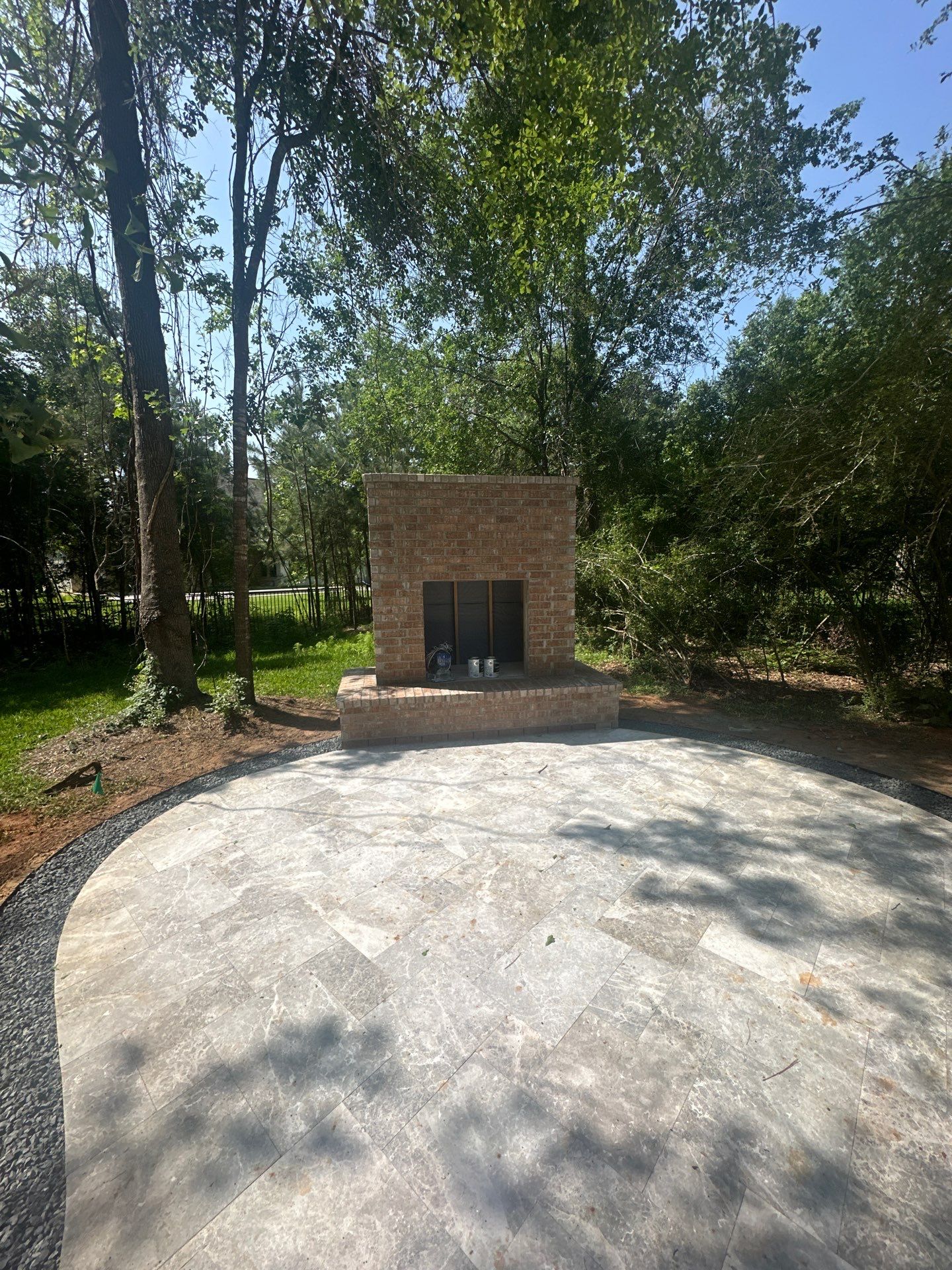 Outdoor Fireplace in Tomball, TX by SophAlx LLC