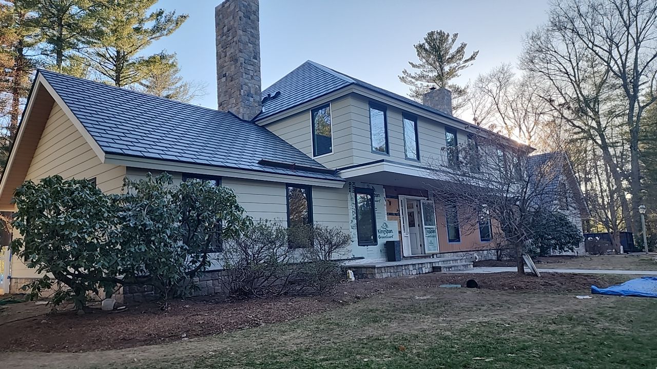 Siding in Weston,  MA by UBrothers Construction