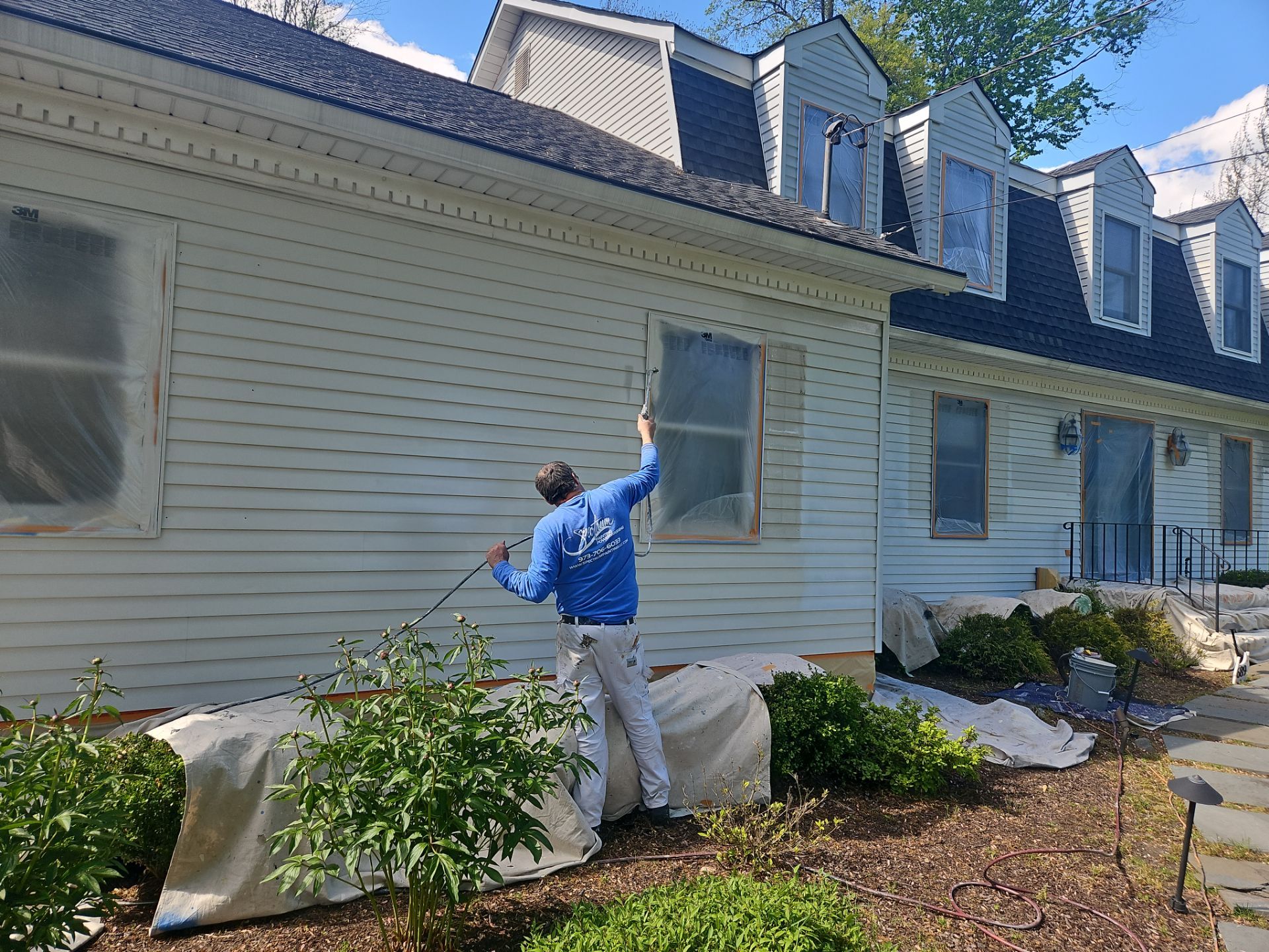Exterior Home Painting and Garage Epoxy Floor Coating in Wyckoff by Spectrum Painting, LLC