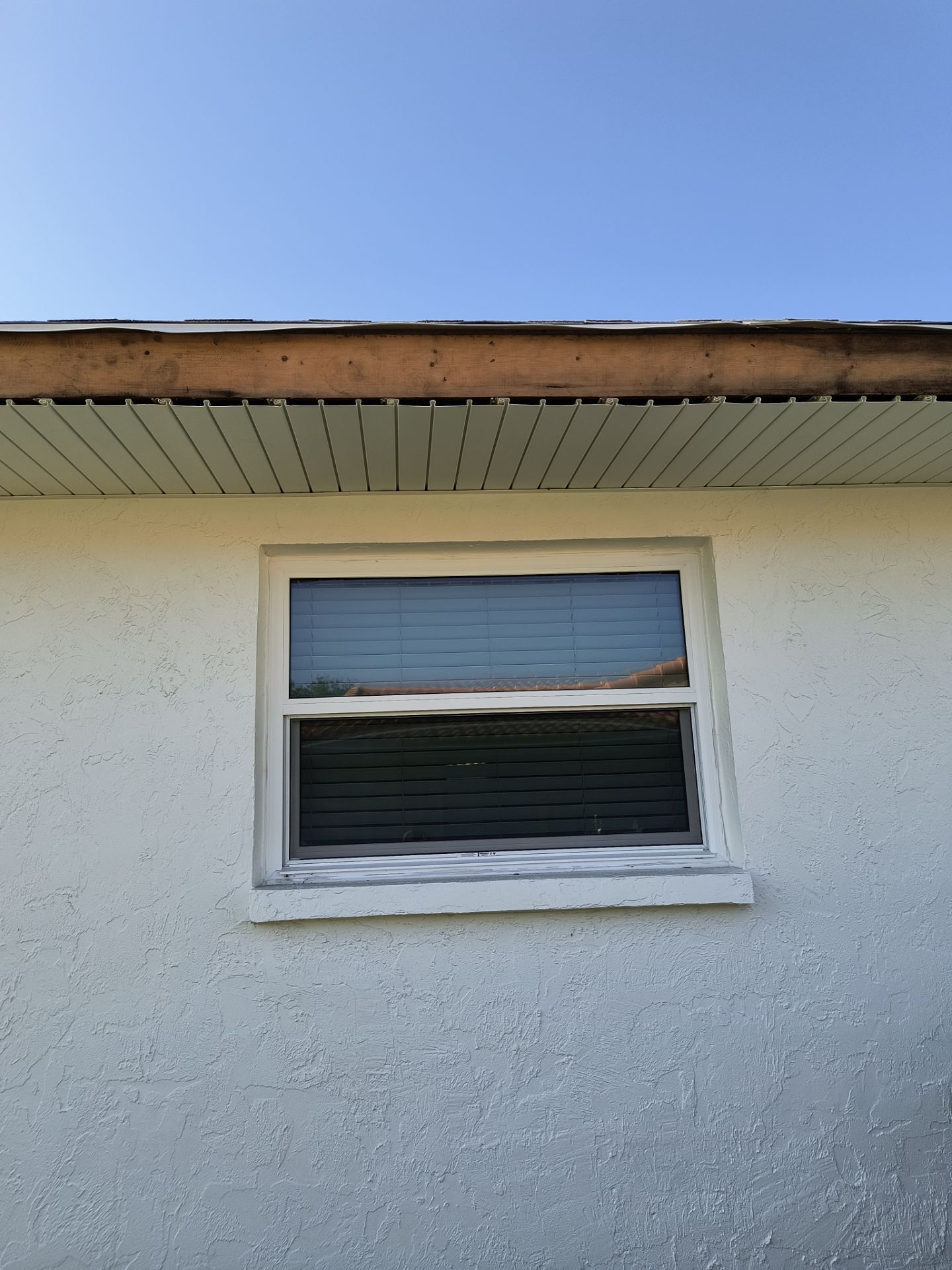 Aluminum White Soffit Installation in Sarasota FL by Gutter Professors