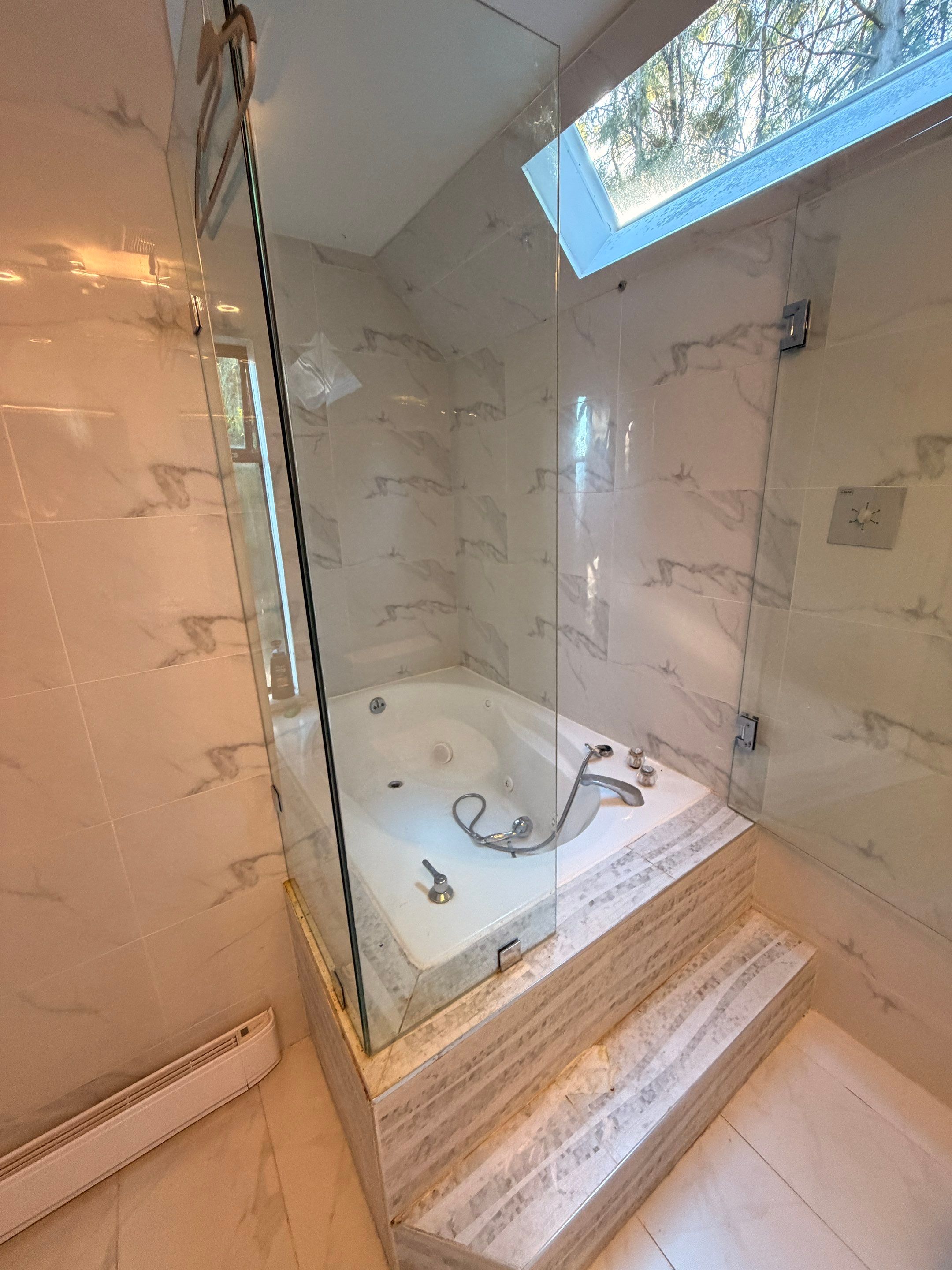 Water Damage Restoration & Bathroom Renovation in West Vancouver by YVR Construction Group