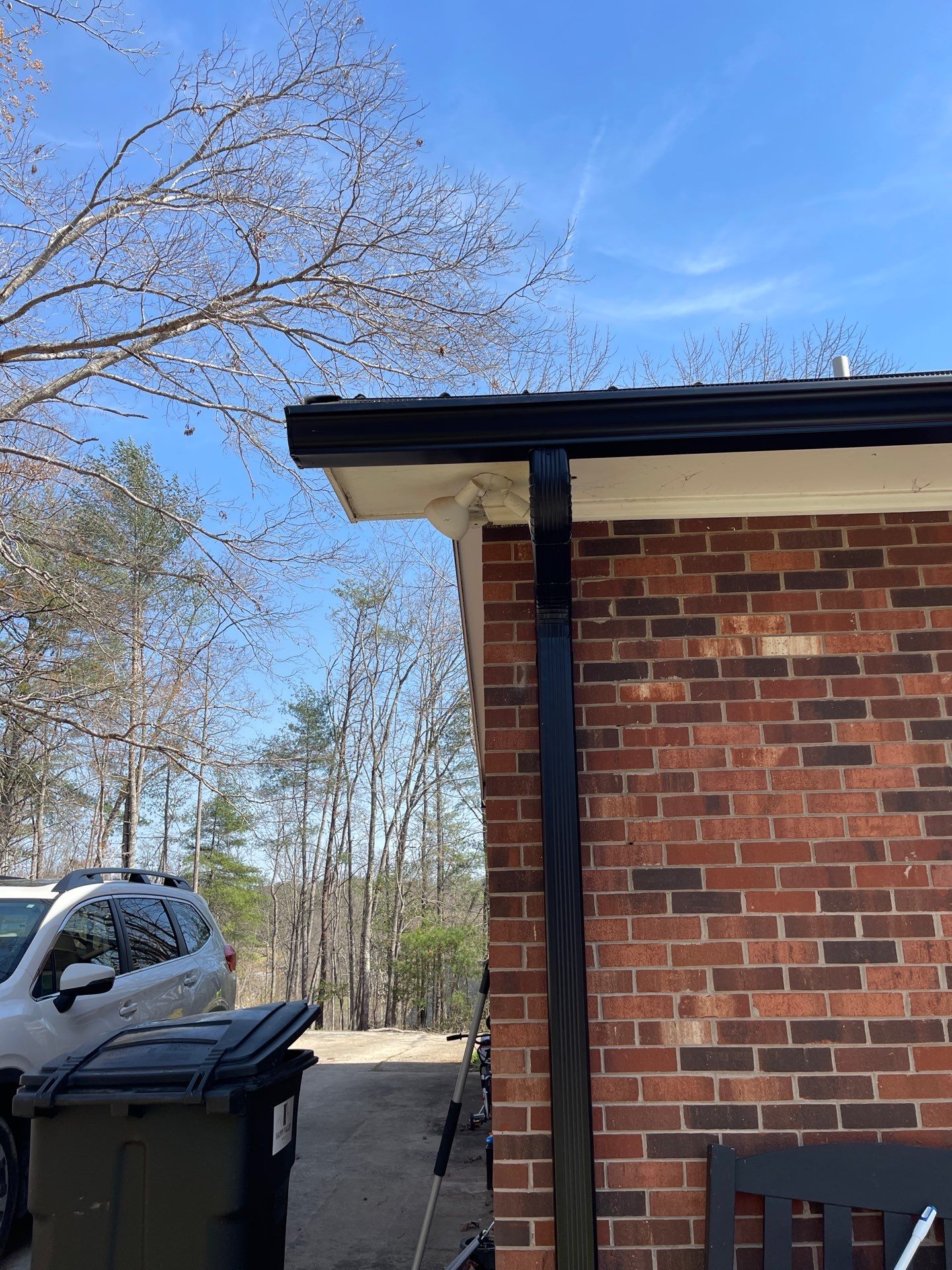 6" Black Gutters and Guards by Peak 2 Peak Services LLC
