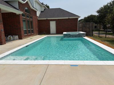 Geometric Pool with Raised Spa and Sun Shelf