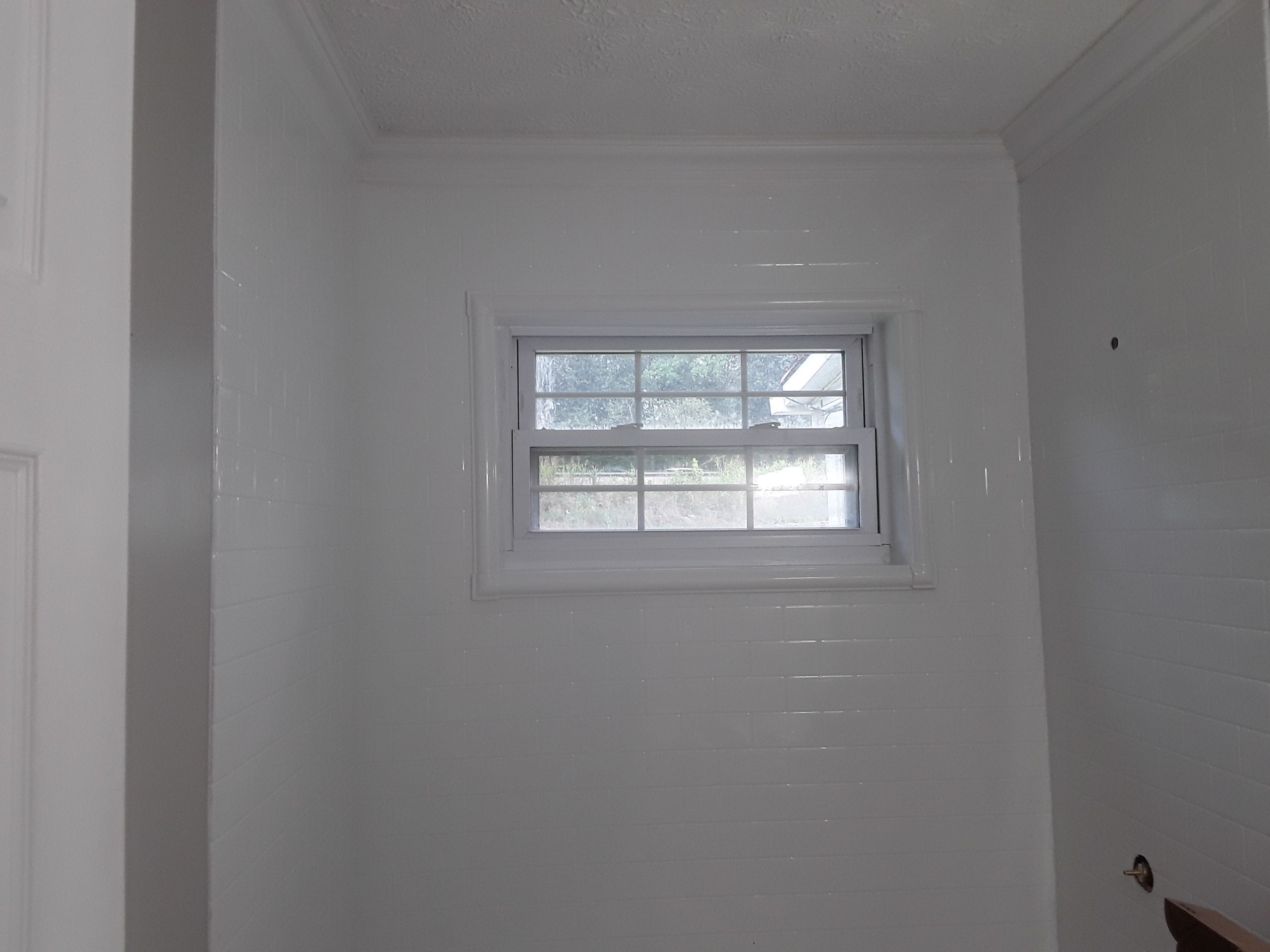 Tub to Shower Conversion using BCI Acrylic Shower System by Secure Construction Company Inc