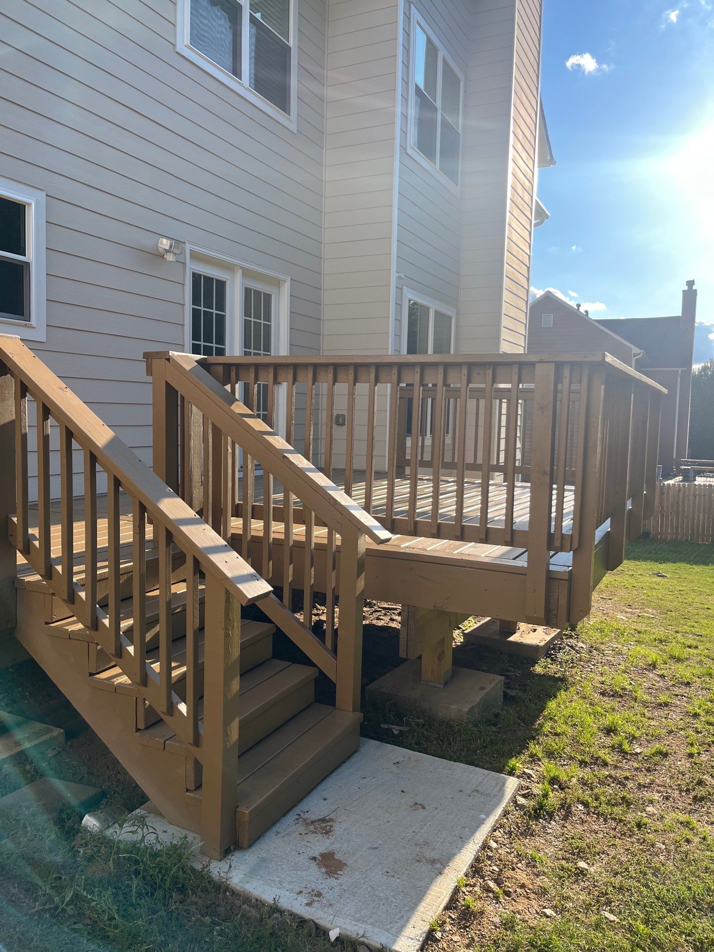 Window & Rotted Wood Replacement, Deck Stain, and Exterior Paint by Nelson Exteriors