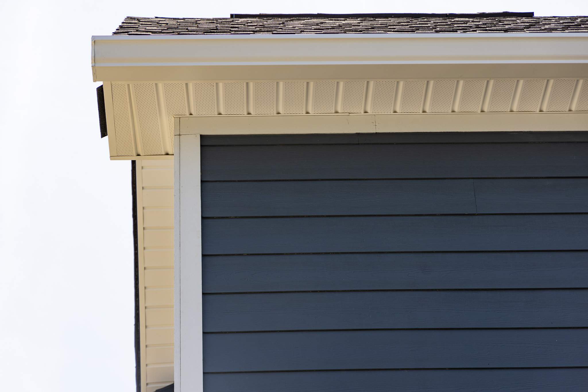 Evening Blue Hardie + Windows by Freedom Exteriors