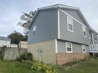 Siding Installation using Vinyl Mastic Ovation by ExteriorPros