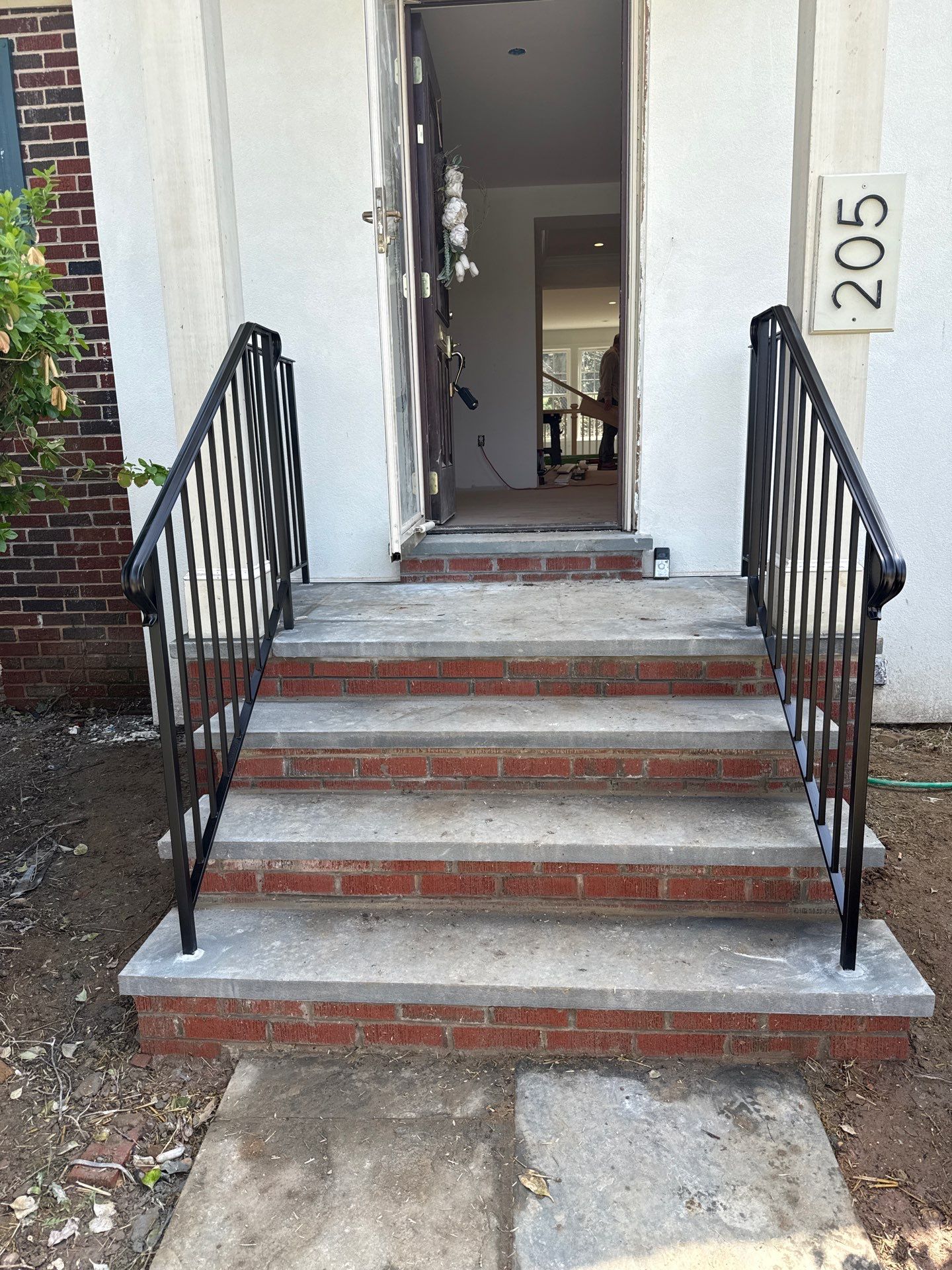 Custom Brick Step and Metal Railing Installation in Silver Spring by Capitol Iron Works