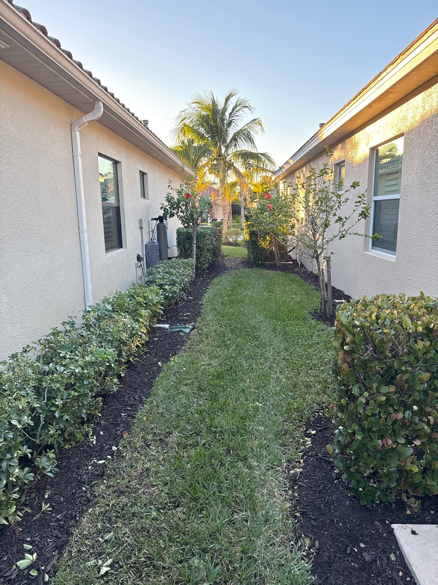 Downspouts using White Down Spouts in Fort Myers FL by Gutter Professors
