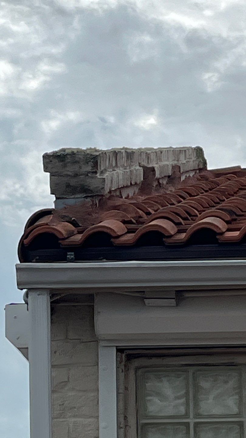 Off with the Tile and on with the TILCOR stone coated metal.  by Bayfront Roofing and Construction