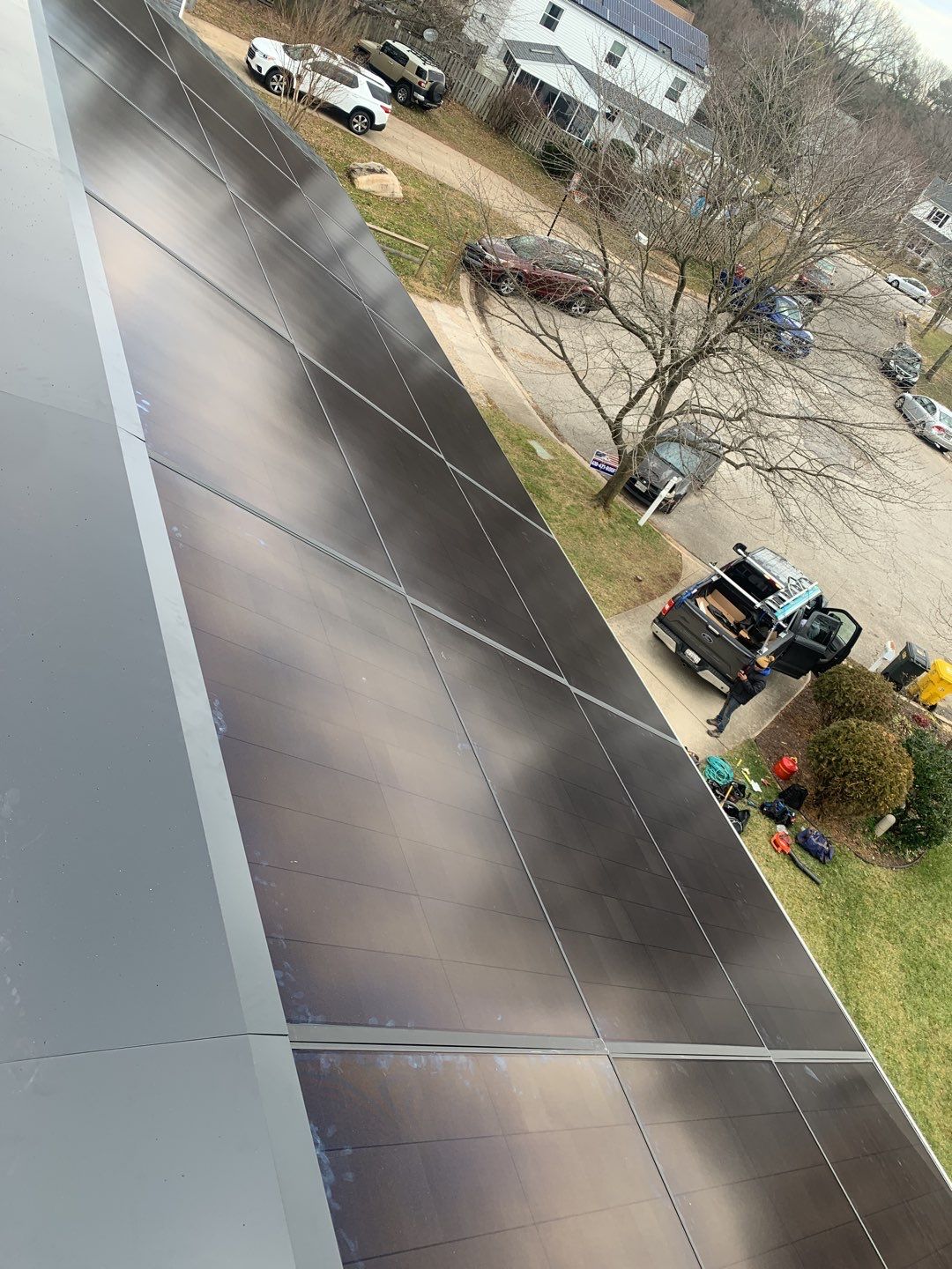 Roof Replacement with GAF Decotech integrated solar panels by American Home Contractors