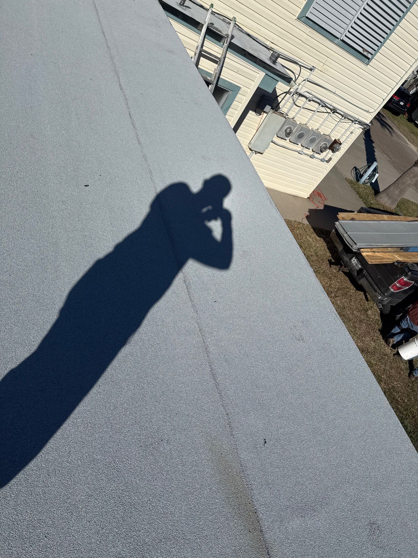 Mustang Island Flat Top by Bayfront Roofing and Construction