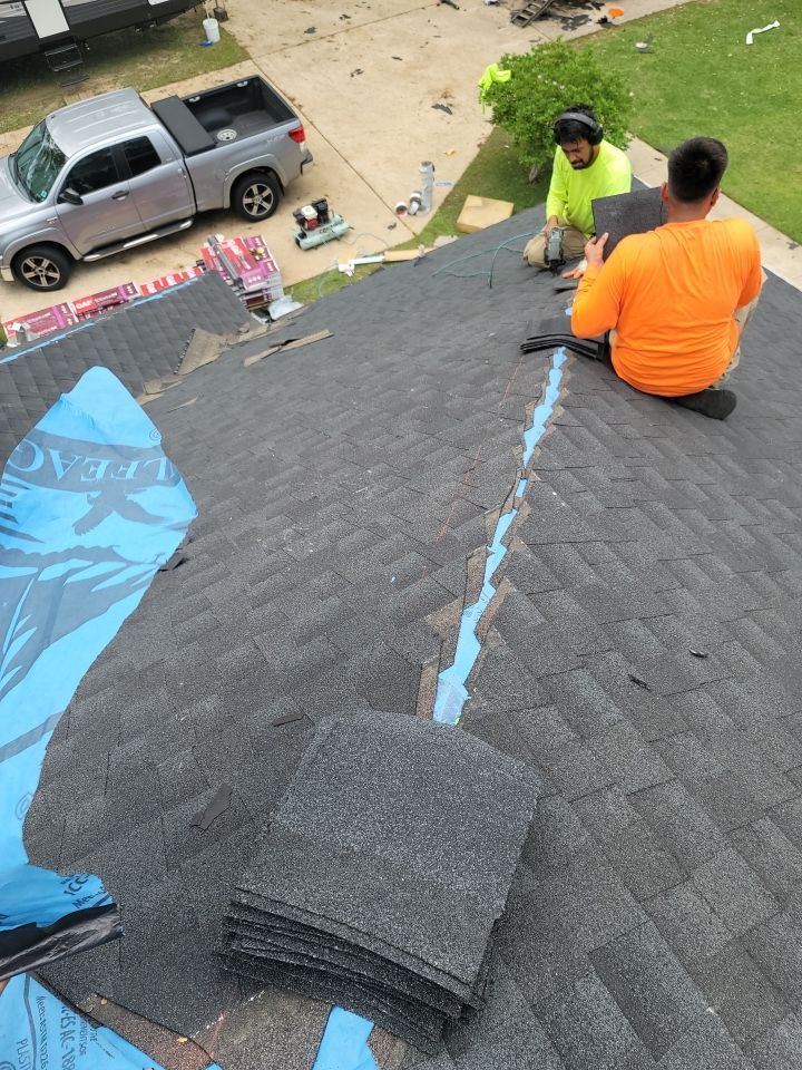 Residential Roofing Installation using Roof Replacement by American Roofing & Construction LLC