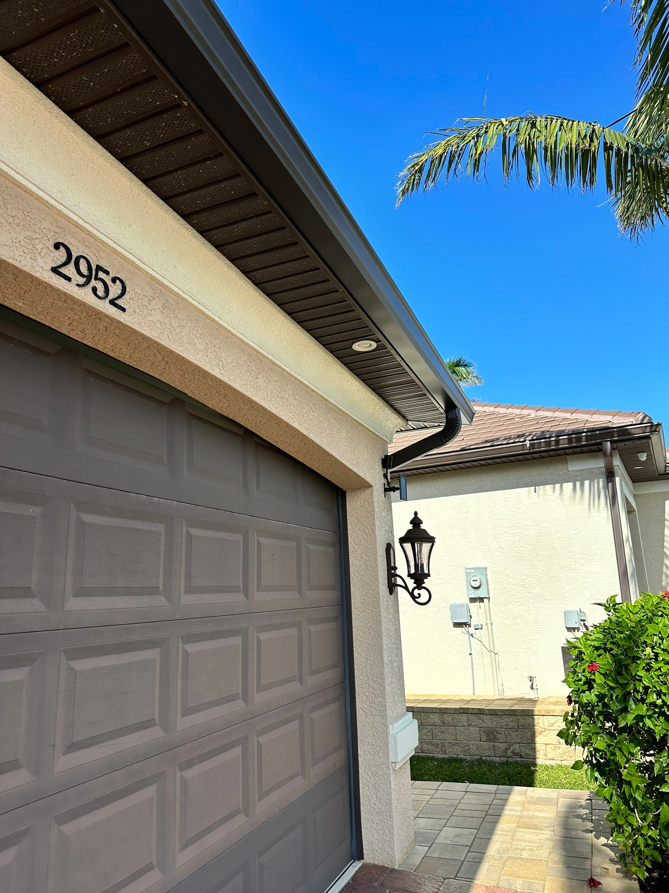 Bronze Downspout Installation in Cape Coral FL by Gutter Professors