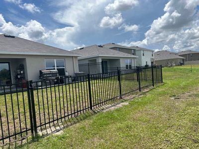 Aluminum Fence Installation using Black 3 Rail Aluminum Fence
