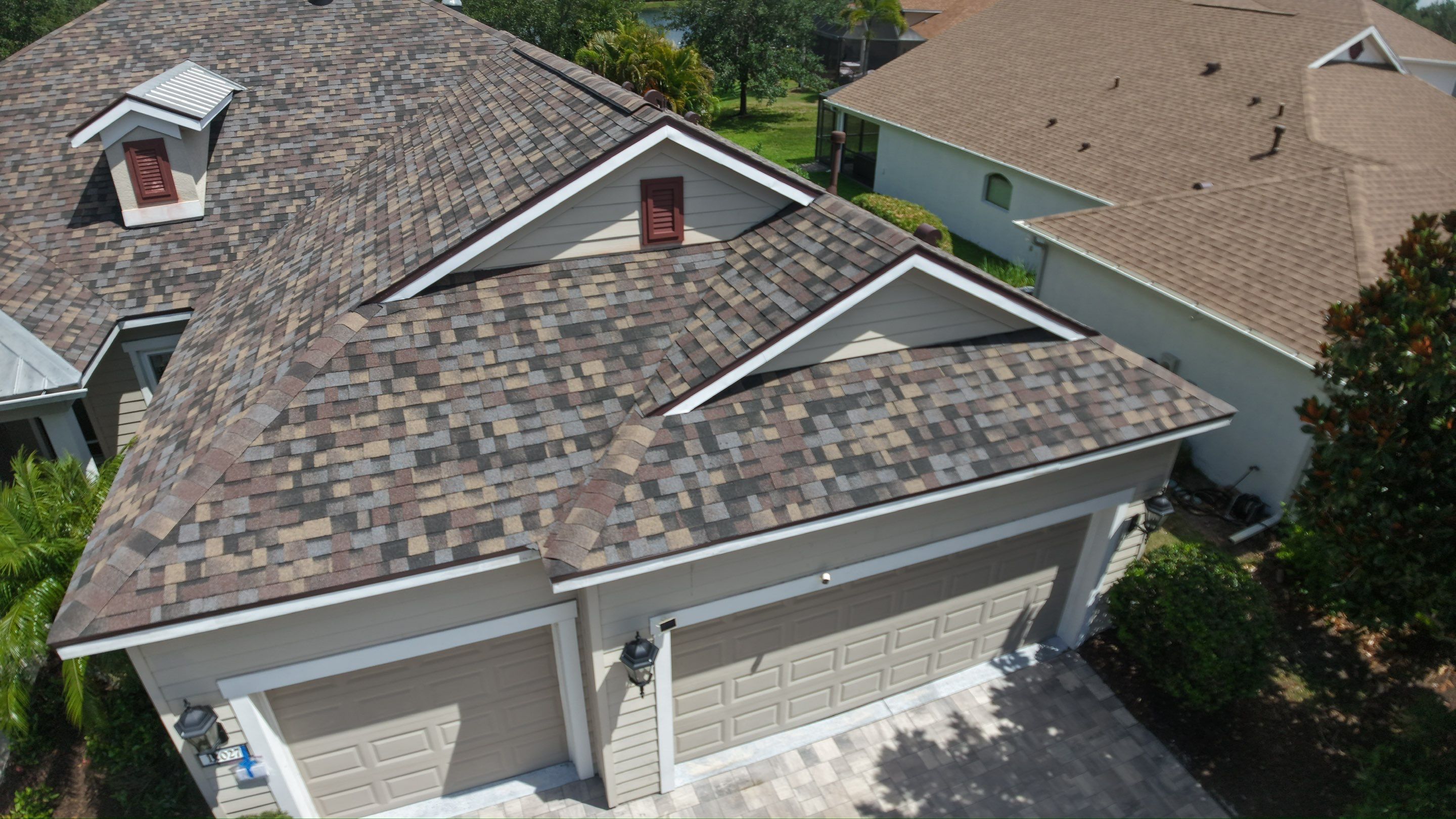 Architectural Summer Harvest Asphalt Shingle Roof Replacement in Bradenton, Florida by Trinity Restoration and Roofing LLC
