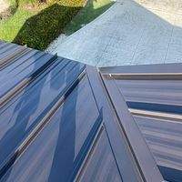 .040 Aluminum 1.5" Mechanical Seam Dark Bronze  by Total Roofing System The Metal Roof Experts