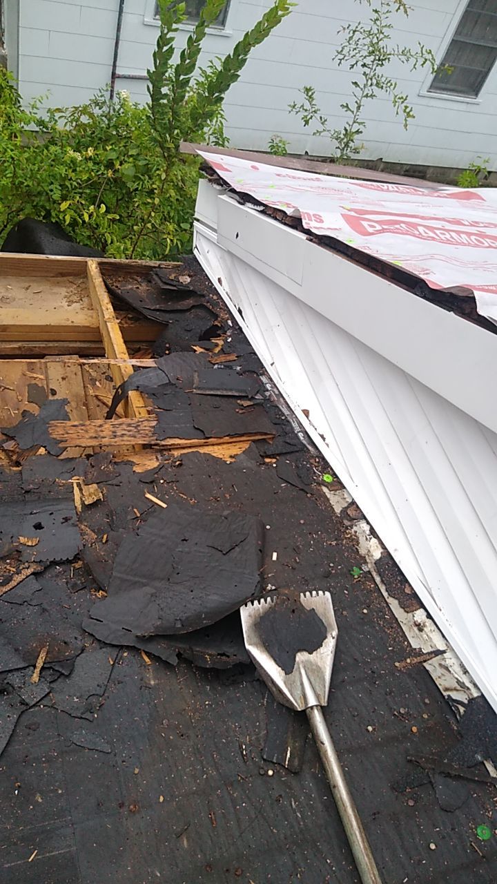 Residential Roofing Installation using Roof Replacement by American Roofing & Construction LLC