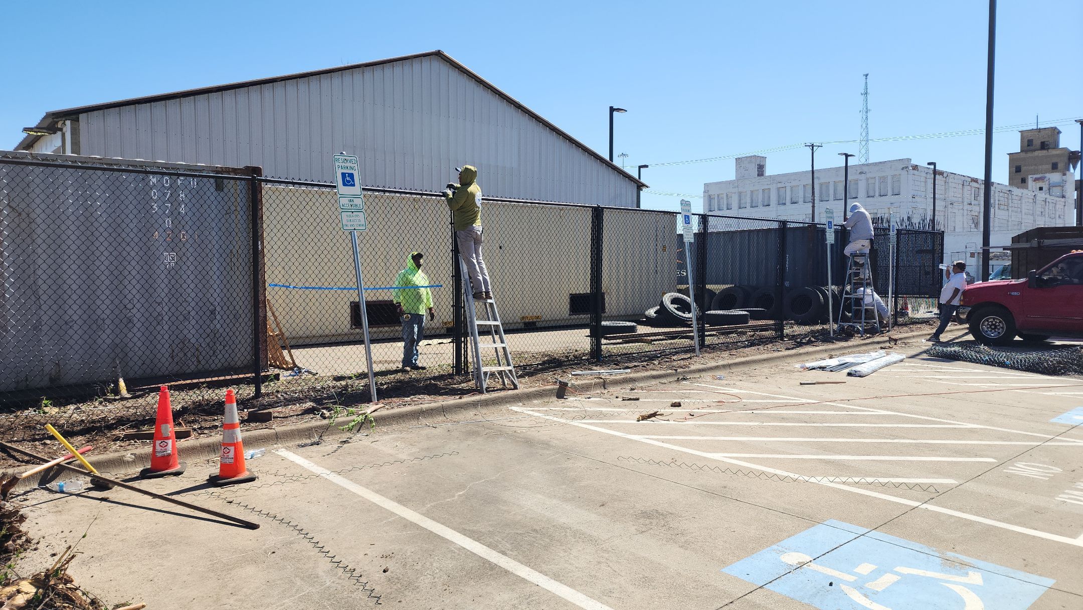 Chain link Privacy Slats by 3:16 Roofing and Construction