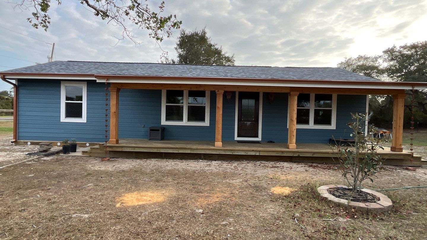 Customized Cabin by Bayfront Roofing and Construction
