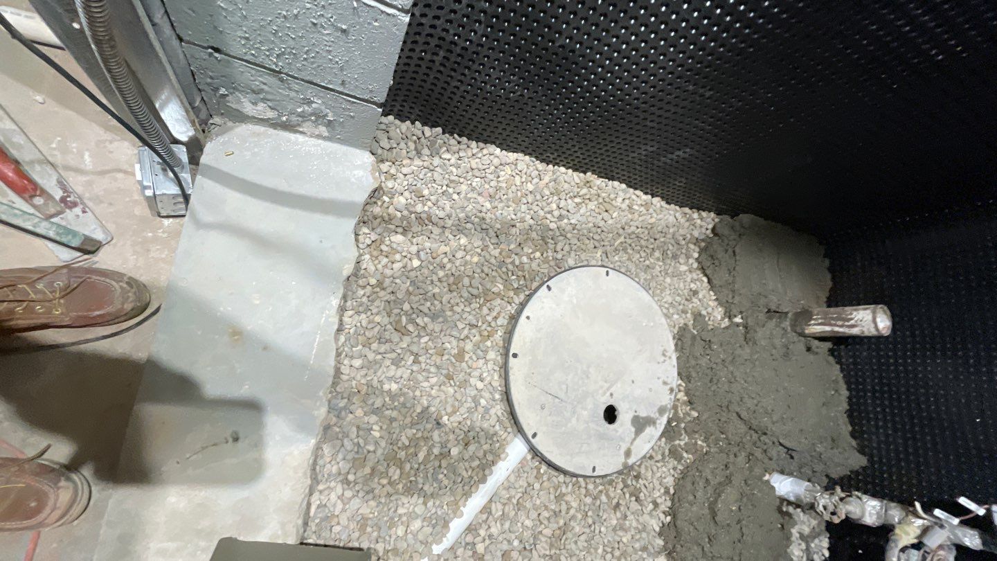 Interior Drain Tile & Sump Pump System in West Minneapolis by Waterproofing Northeast