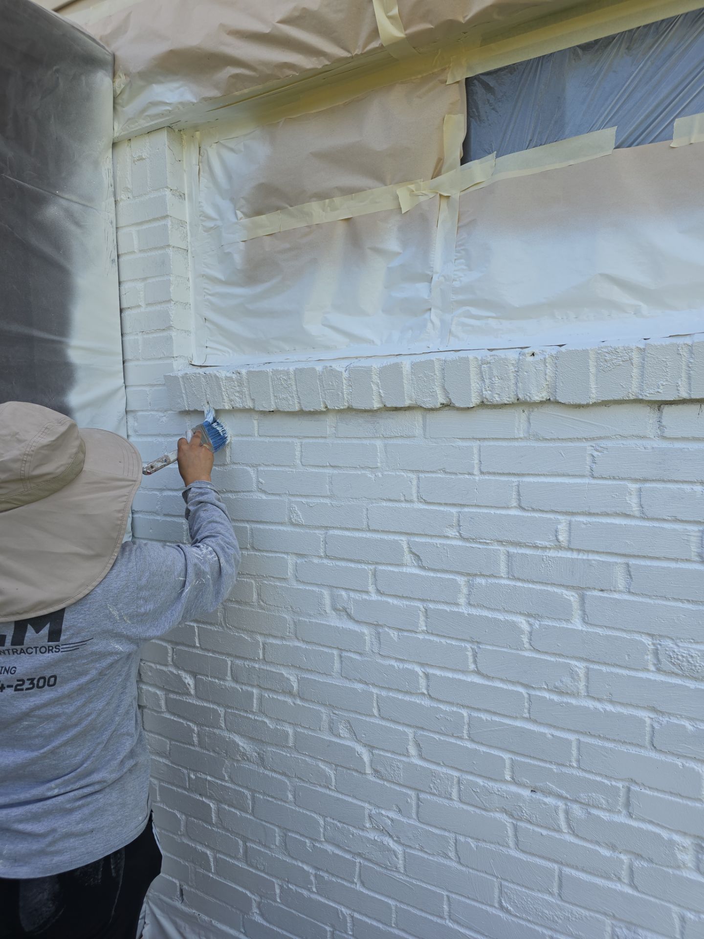 Exterior Home Paint Project with Different Surfaces by SLM General Contractors & Roofing