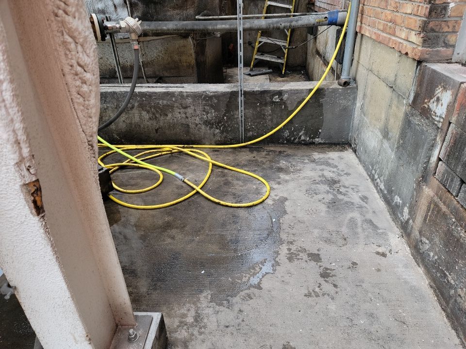 commercial pressure washing using Hot water by Northern Power Washing LLC.