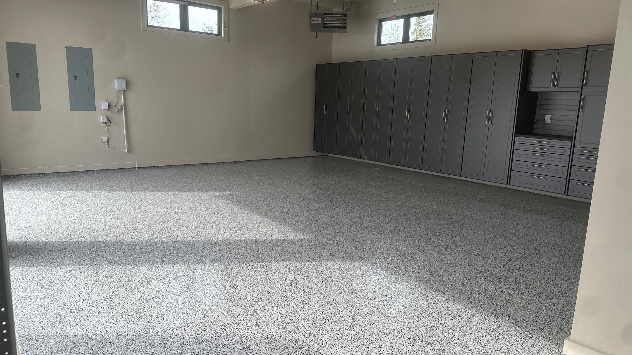 Tim S. added Cabinets and a Banner Garage Floor to his garage by Banner Garage