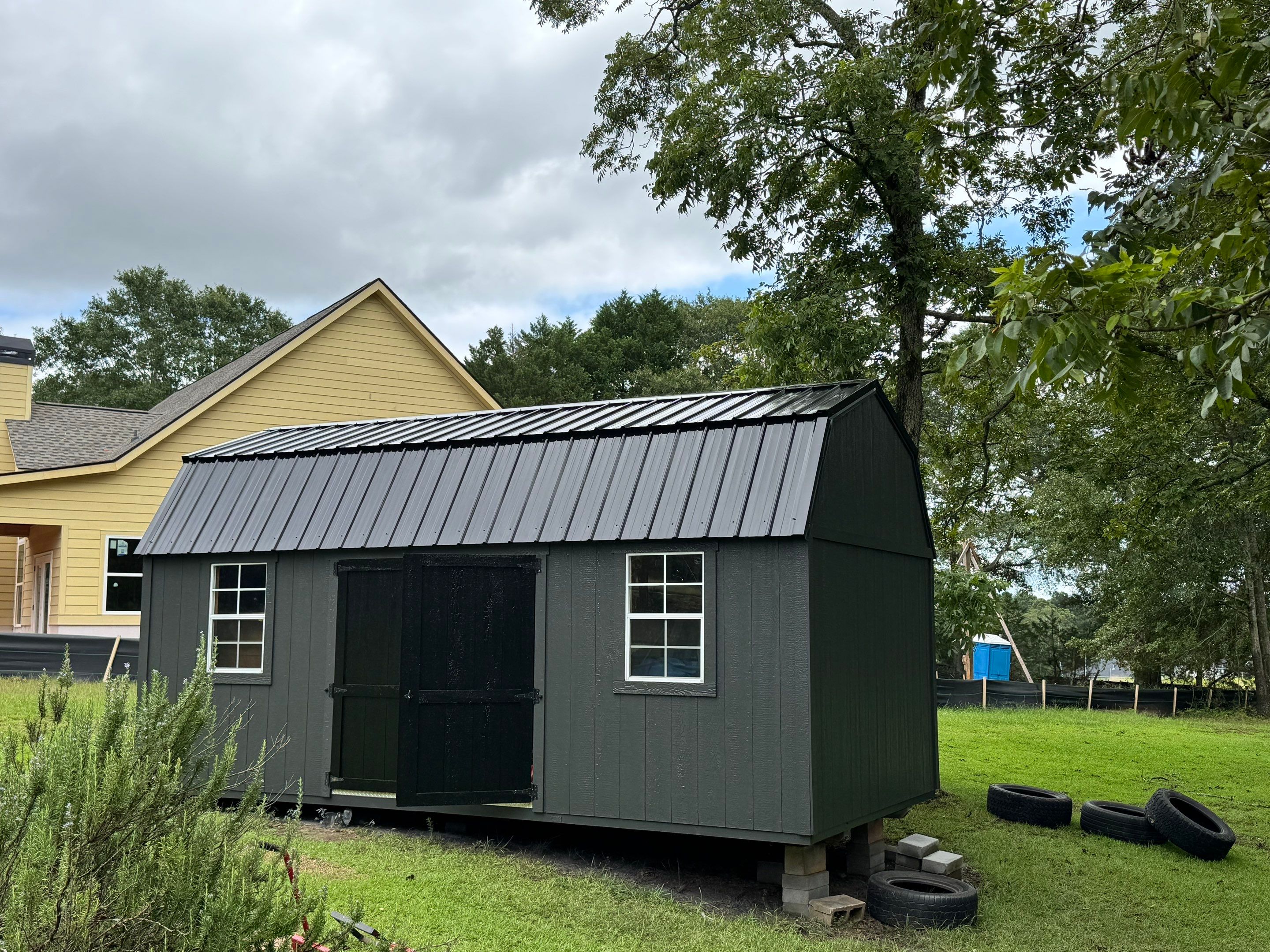 Social Circle Masonry Transformation with Dark Charcoal Exterior Painting by PGP Surface Solutions, LLC