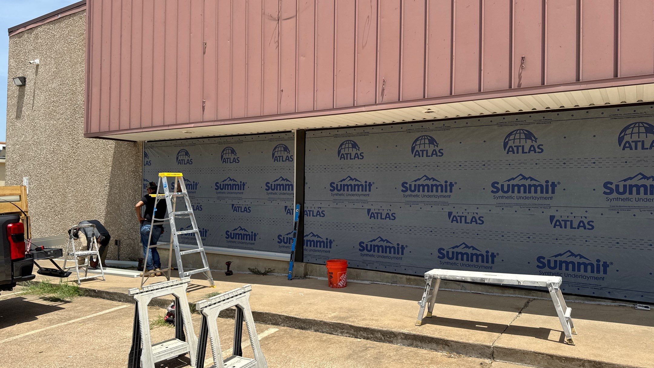 Commercial Building using Various Exterior Products by Harvey Roofing & Construction
