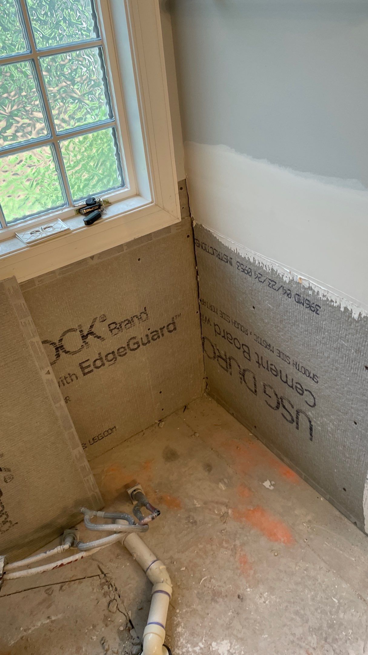 Bright Bathroom Remodel with Wall Removal, Stand Alone Tub and New Vanity by Footprints Floors of Coastal Carolina